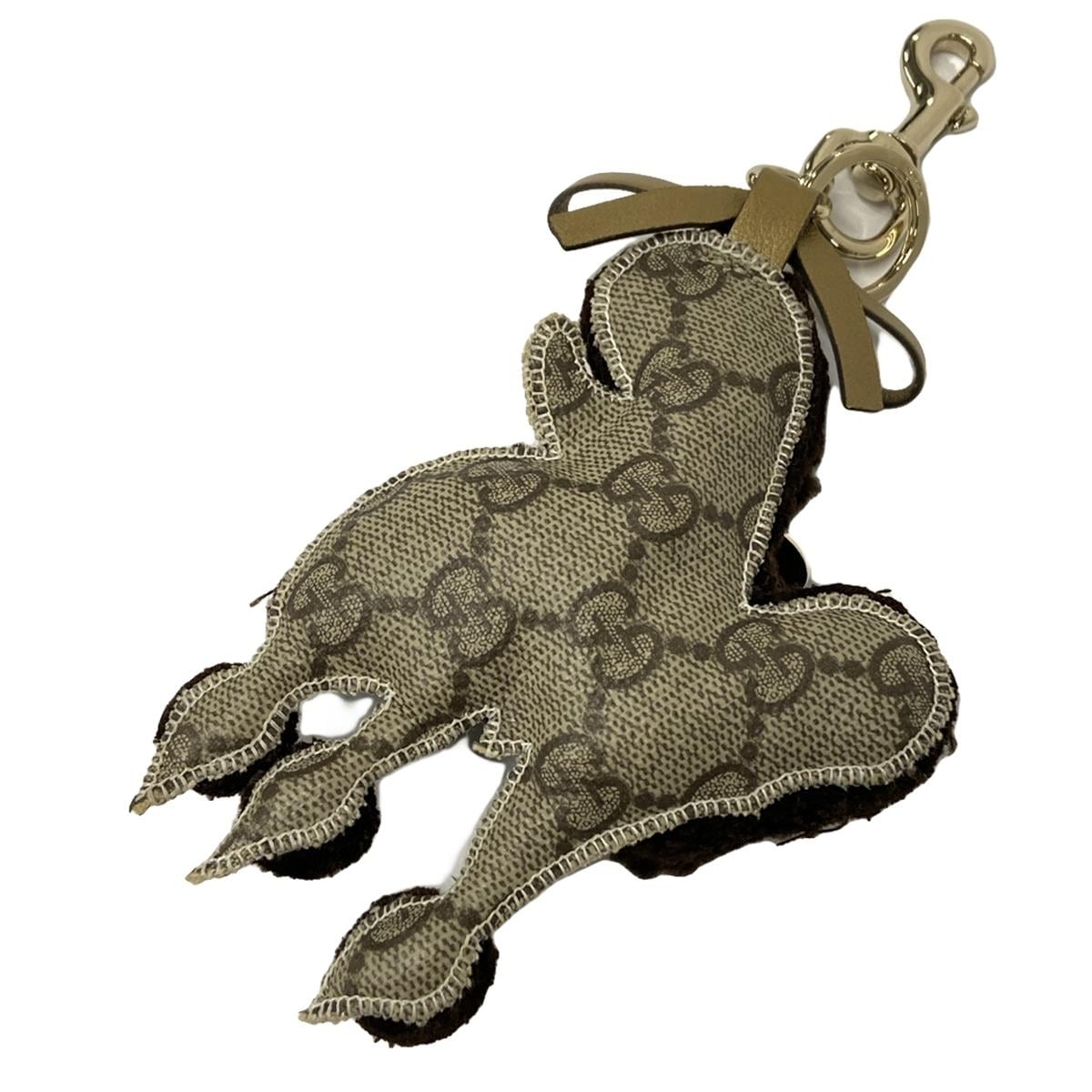 Charm para bolso GG de segunda mano en piel de PVC color beige y marrón