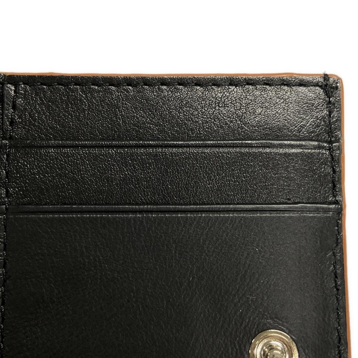 PRE-OWNED Black Brown Pebble Grain Calf Anagram Trifold Wallet