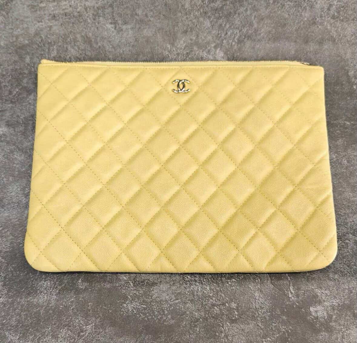 PRE-OWNED CC Medium Quilted Caviar Pouch