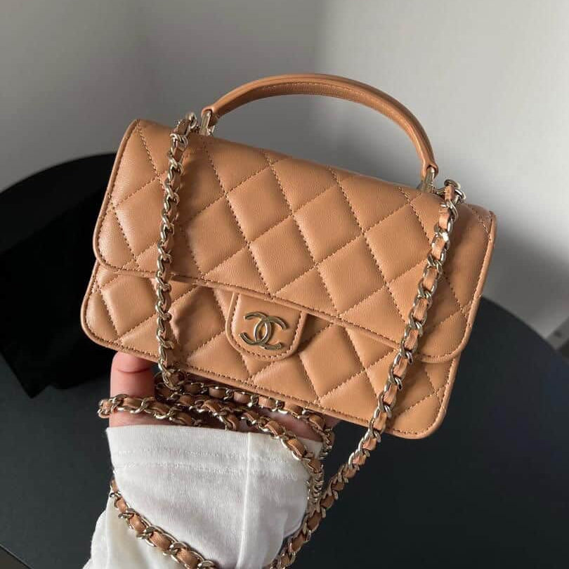 PRE-OWNED CC Beige Quilted Lambskin Top Handle Clutch (PART 1)