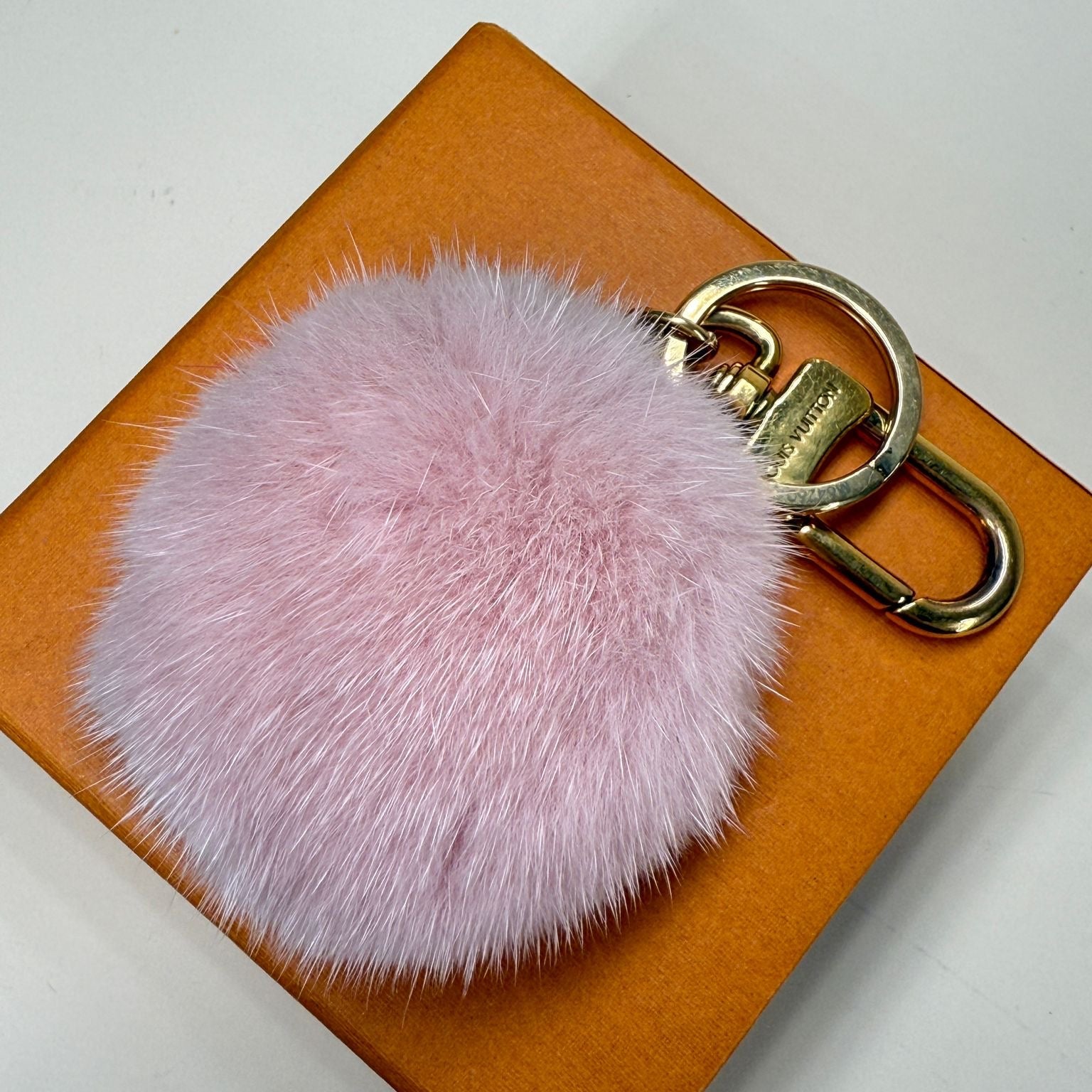 PRE-OWNED LV Calfskin Mink Fur Wild Pig Bag Charm Key Holder 