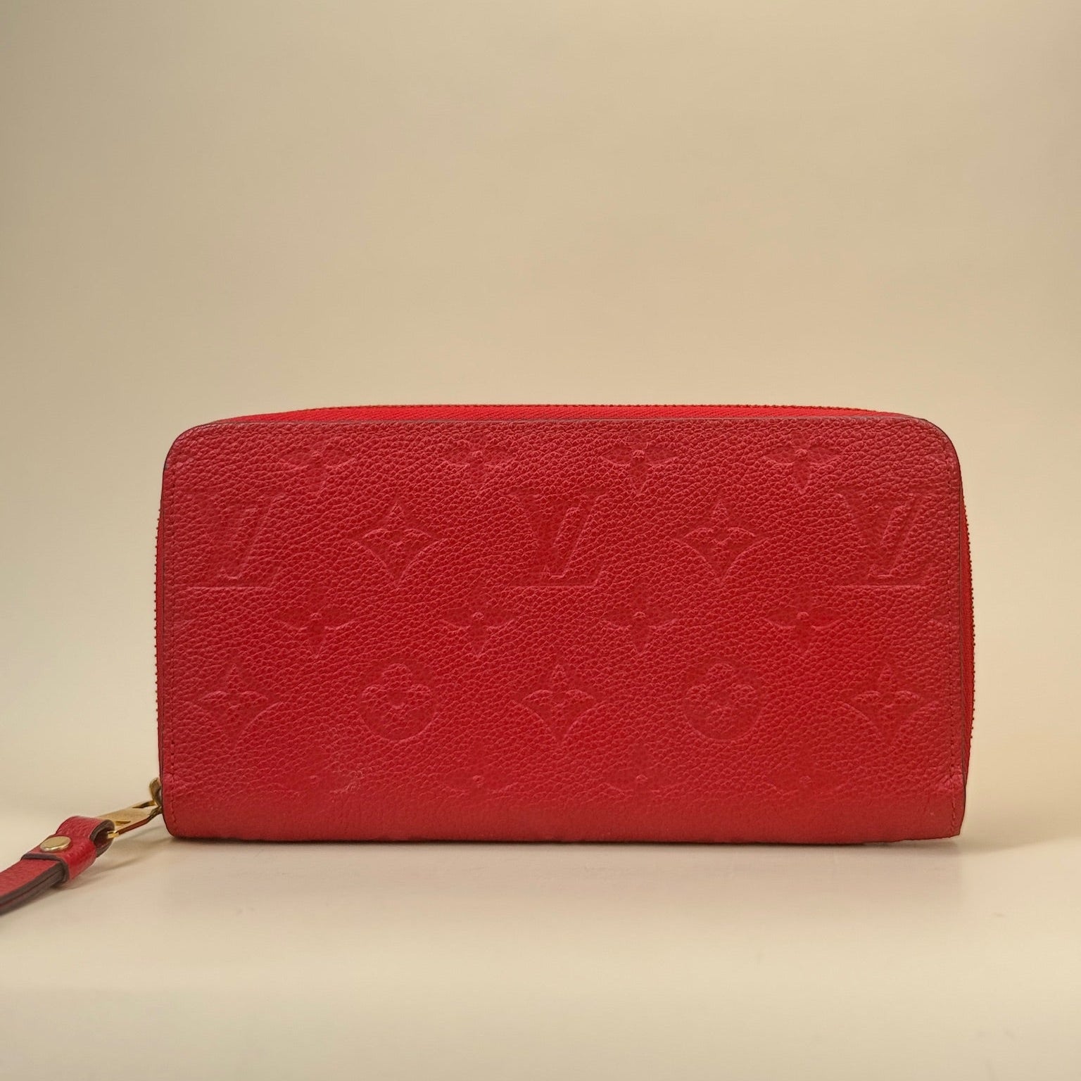 PRE-OWNED LV Red Monogram Empreinte Calfskin Zippy Long Wallet