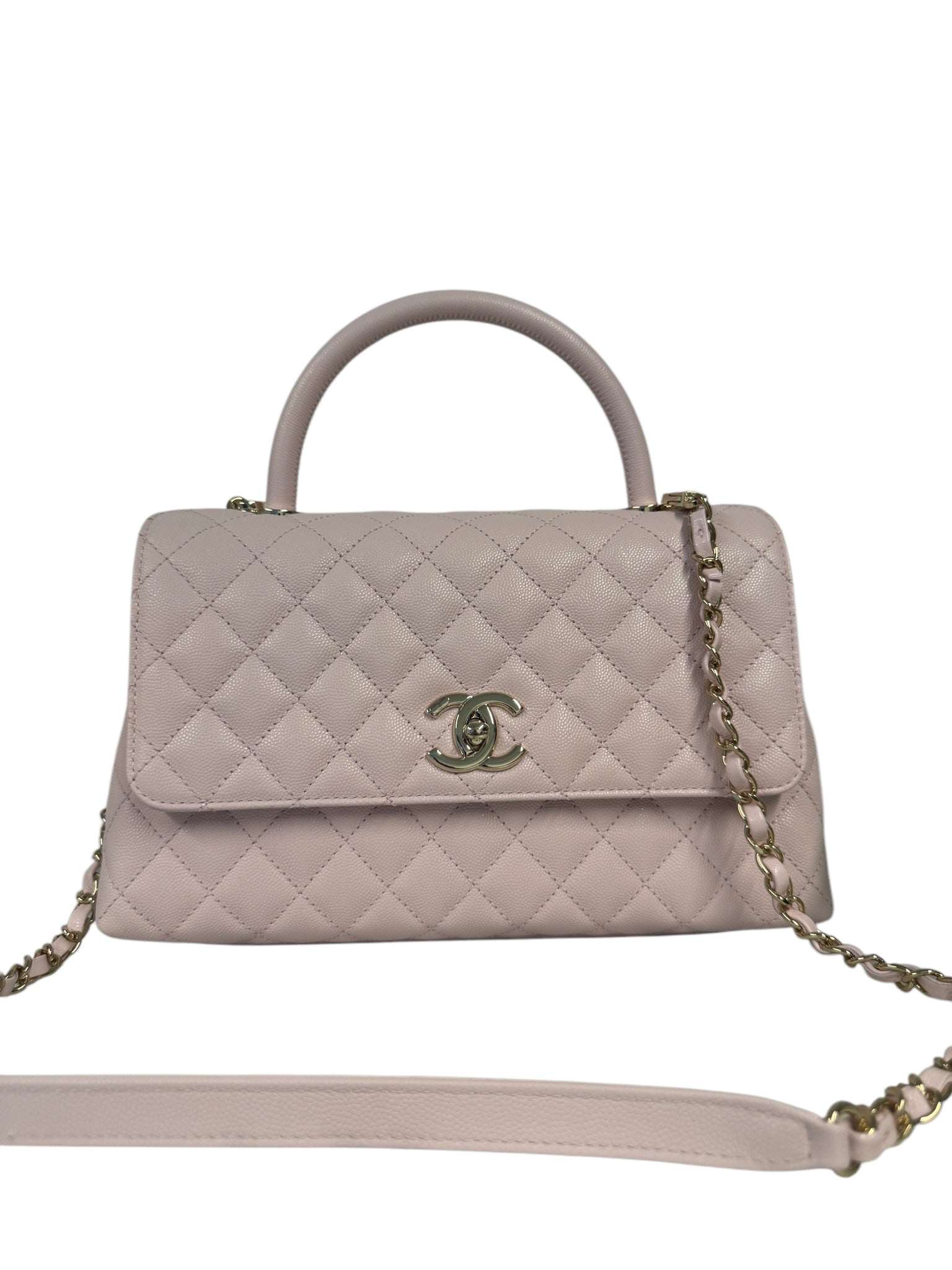 Bolso pequeño con asa en la parte superior en caviar acolchado color rosa CC USADO