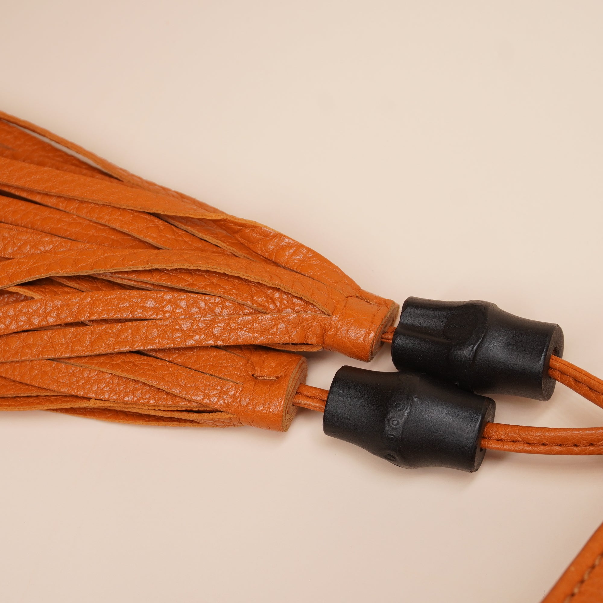 PRE-OWNED GG Orange Leather Bamboo Tassel Clutch