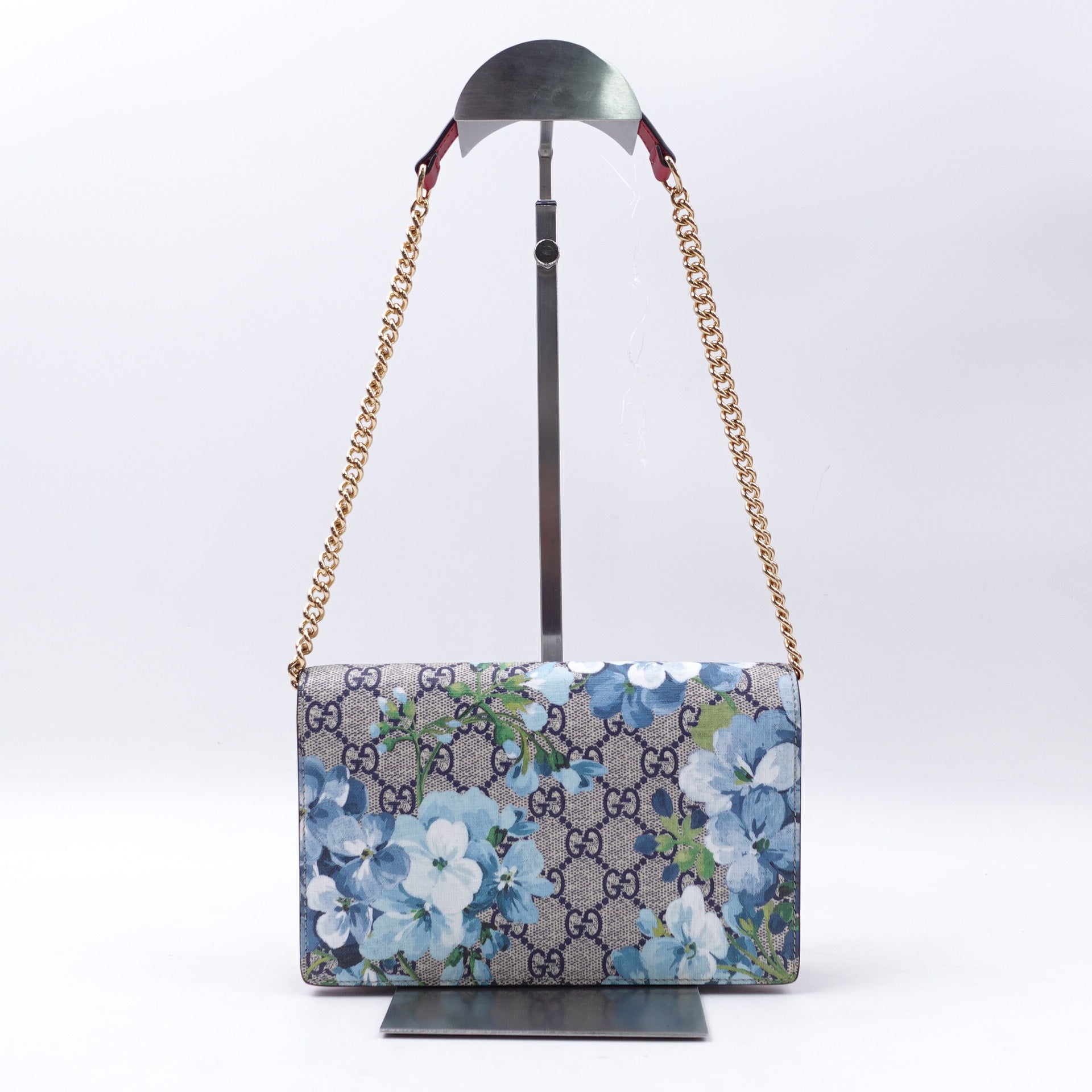 Cartera con cadena y estampado GG de lona revestida en azul Blooms de segunda mano
