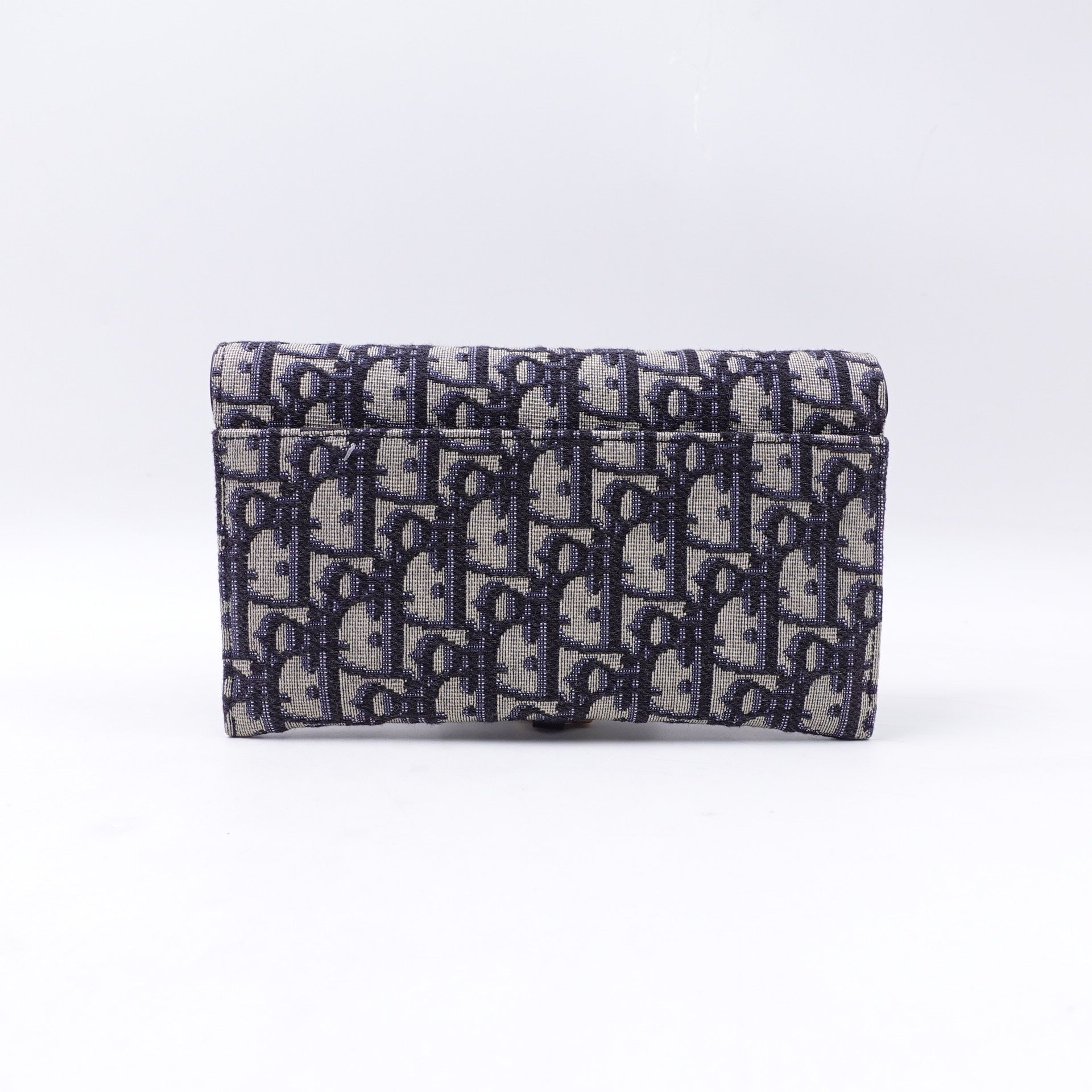 Cartera de lona oblicua azul marino de segunda mano con cadena
