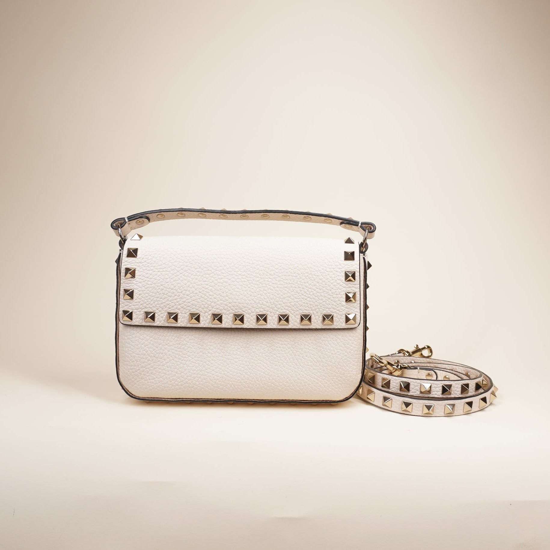 PRE-OWNED Rockstud Grainy Calfskin Pouch Shoulder Bag