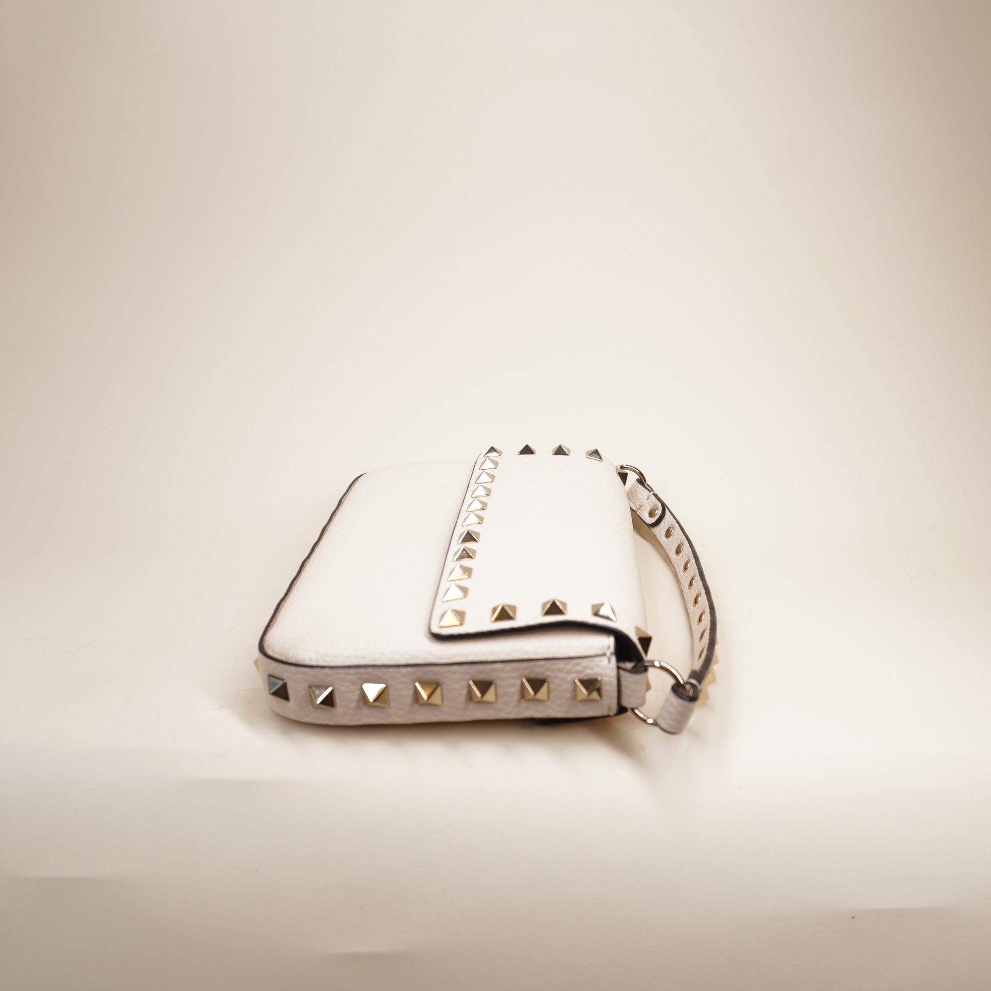 PRE-OWNED Rockstud Grainy Calfskin Pouch Shoulder Bag