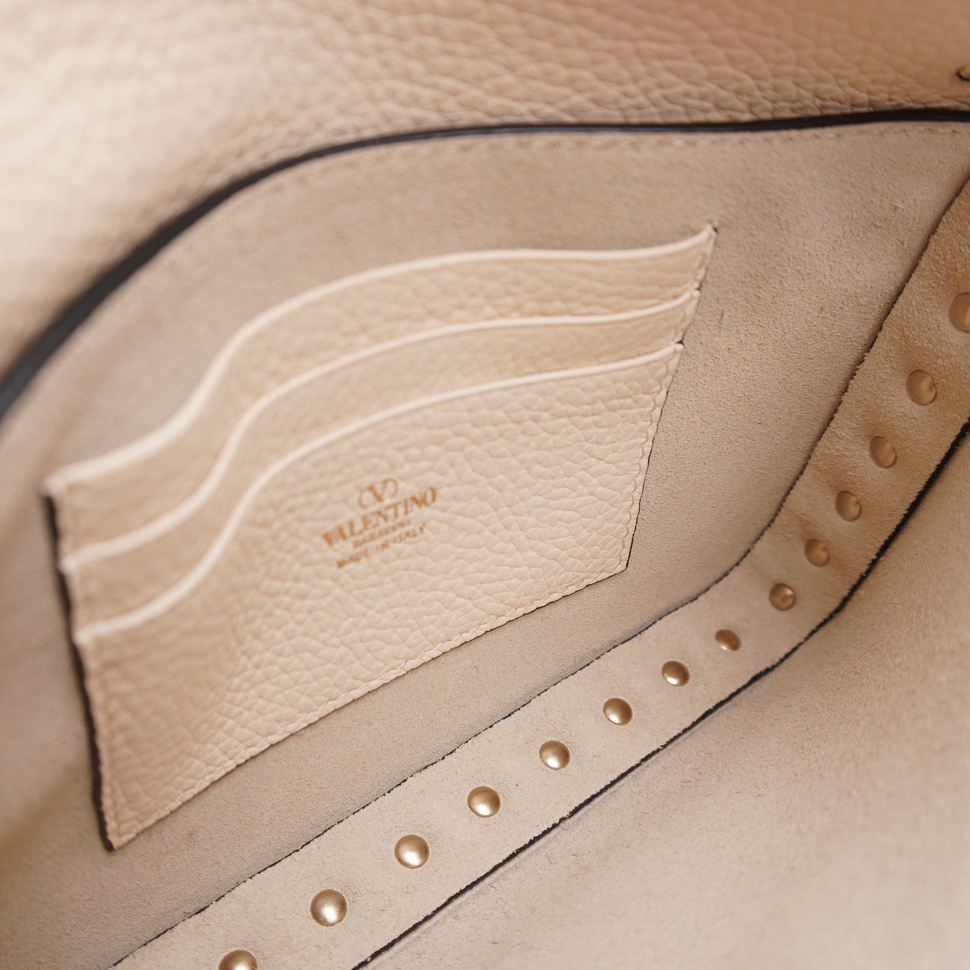 PRE-OWNED Rockstud Grainy Calfskin Pouch Shoulder Bag