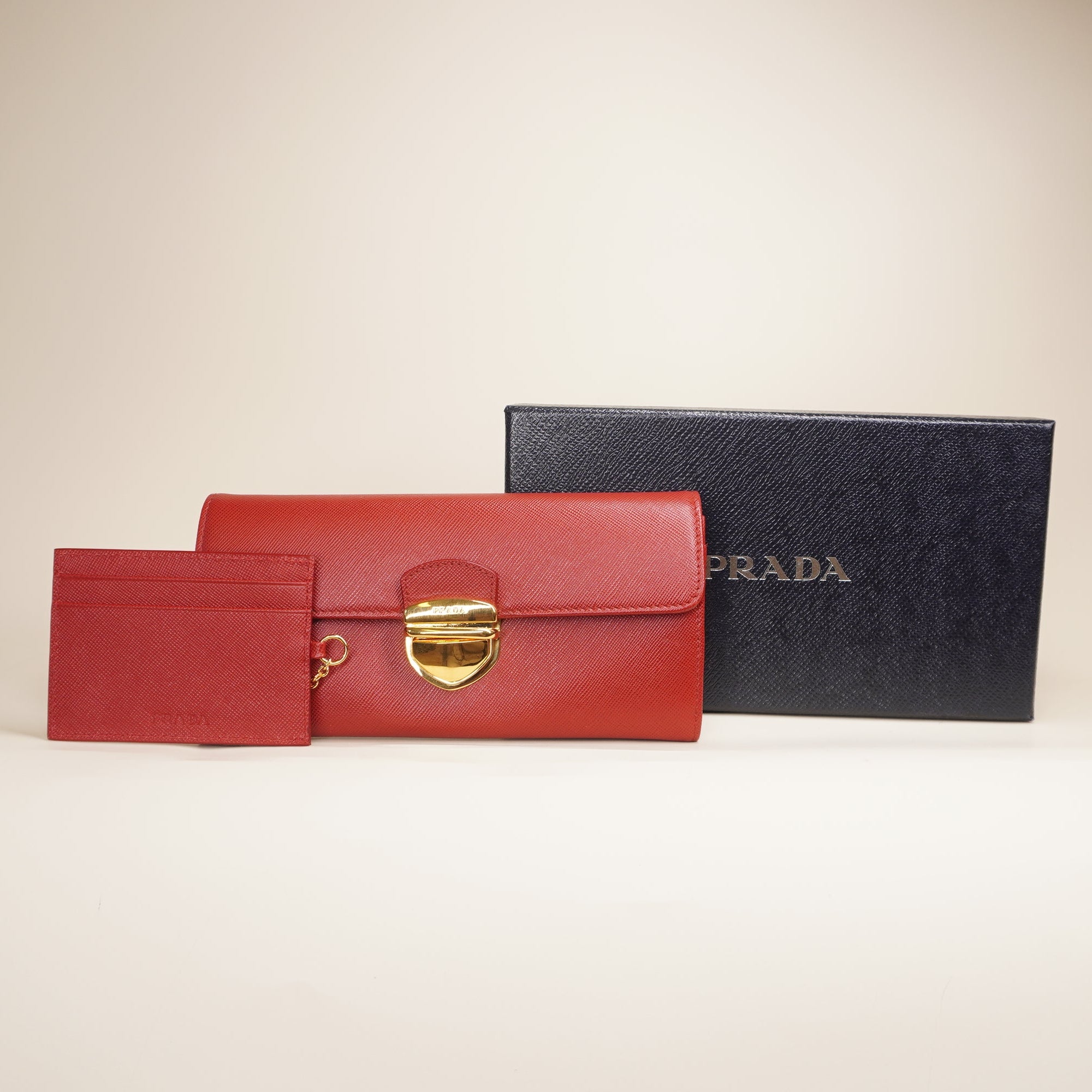 PRE-OWNED Red Saffiano Tuc Leather Continental Flap Wallet