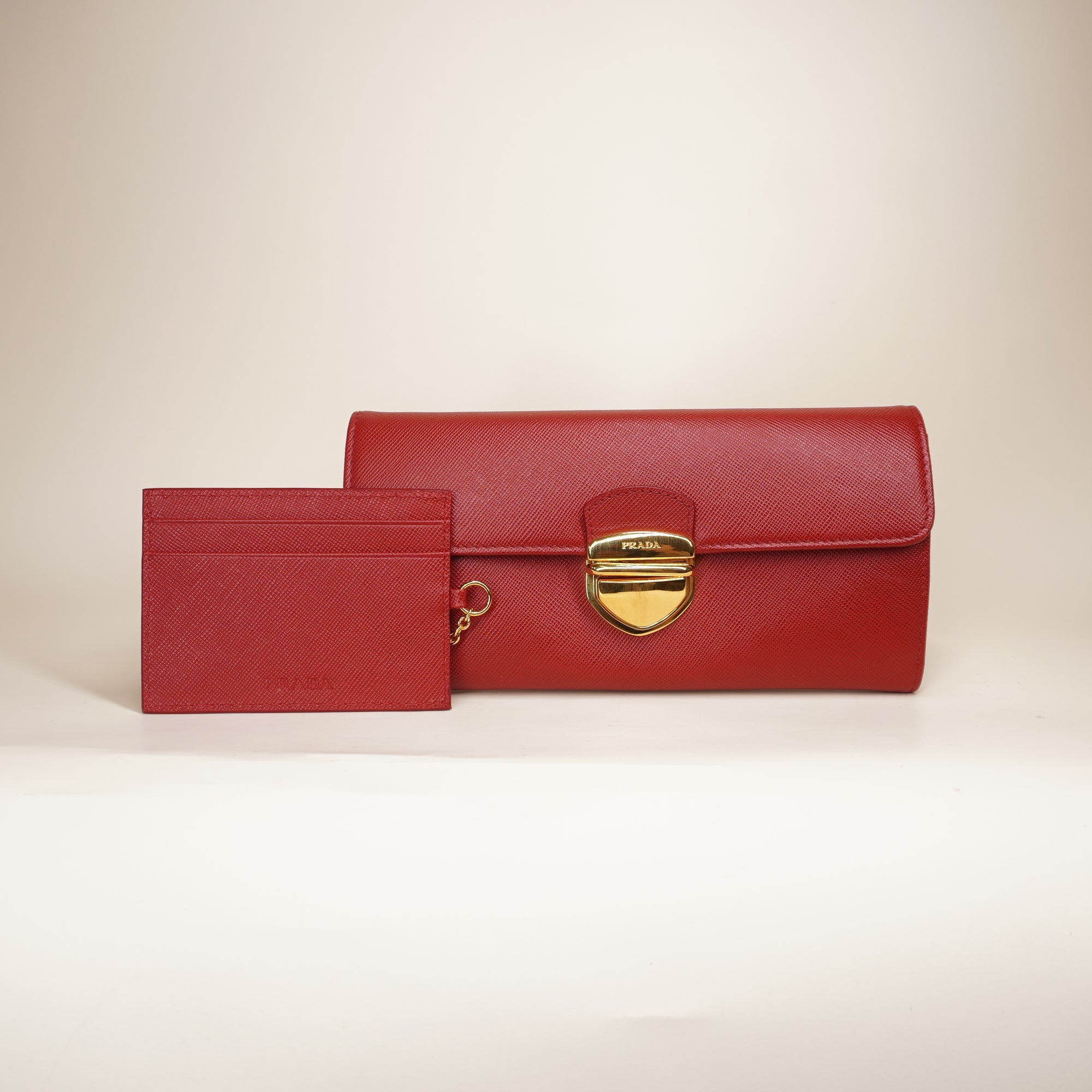 PRE-OWNED Red Saffiano Tuc Leather Continental Flap Wallet