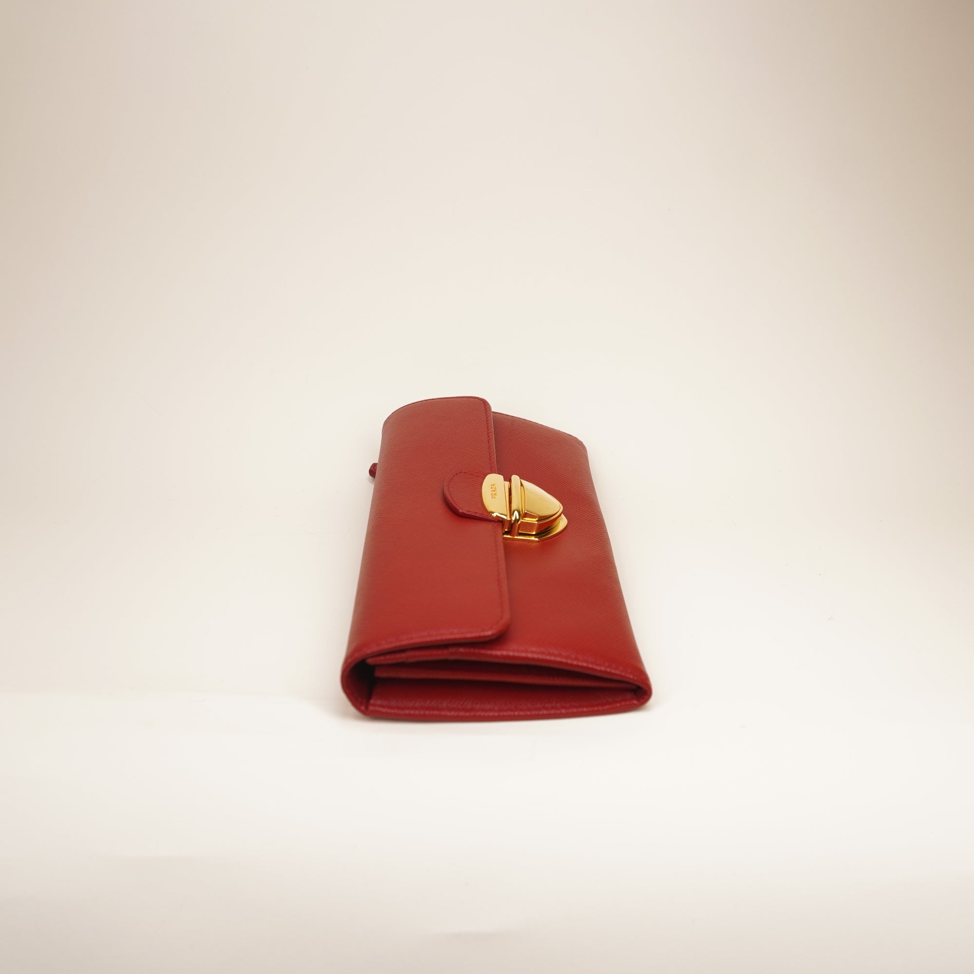 PRE-OWNED Red Saffiano Tuc Leather Continental Flap Wallet