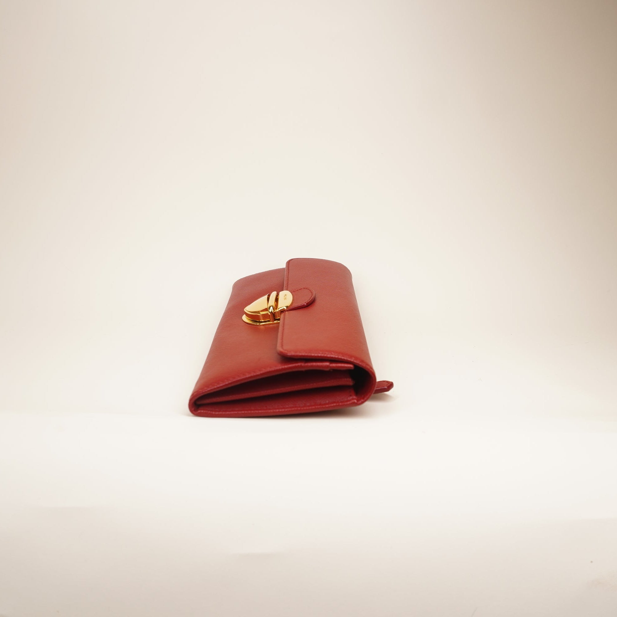 PRE-OWNED Red Saffiano Tuc Leather Continental Flap Wallet