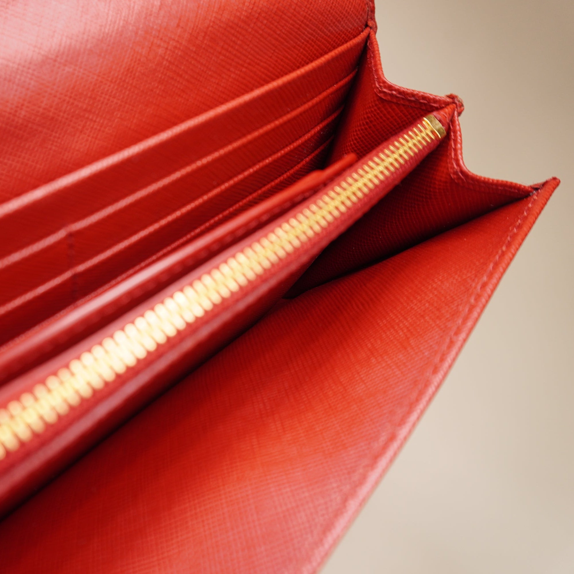 PRE-OWNED Red Saffiano Tuc Leather Continental Flap Wallet