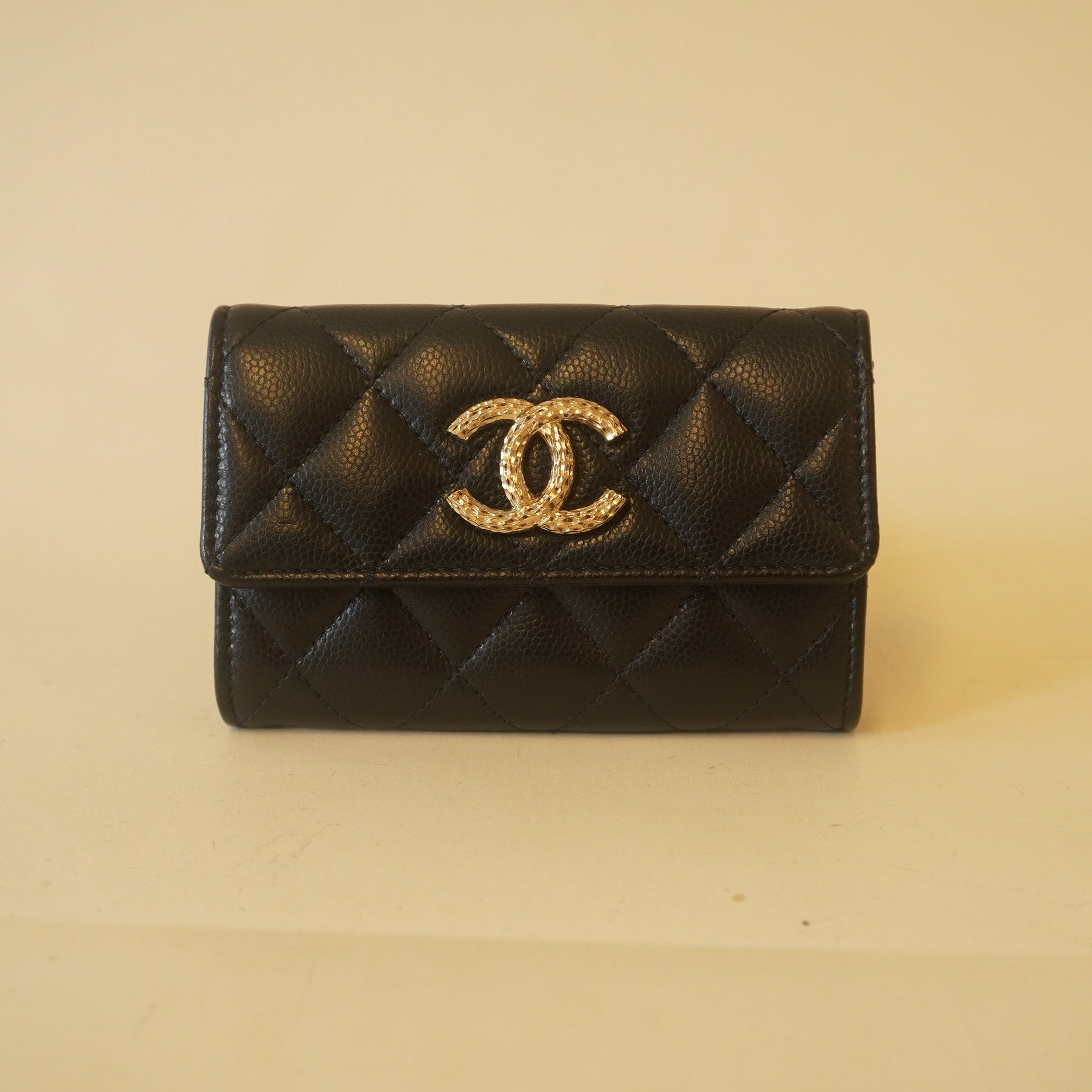 PRE-OWNED Caviar Metal Perforated Quilted CC Flap Card Holder Black