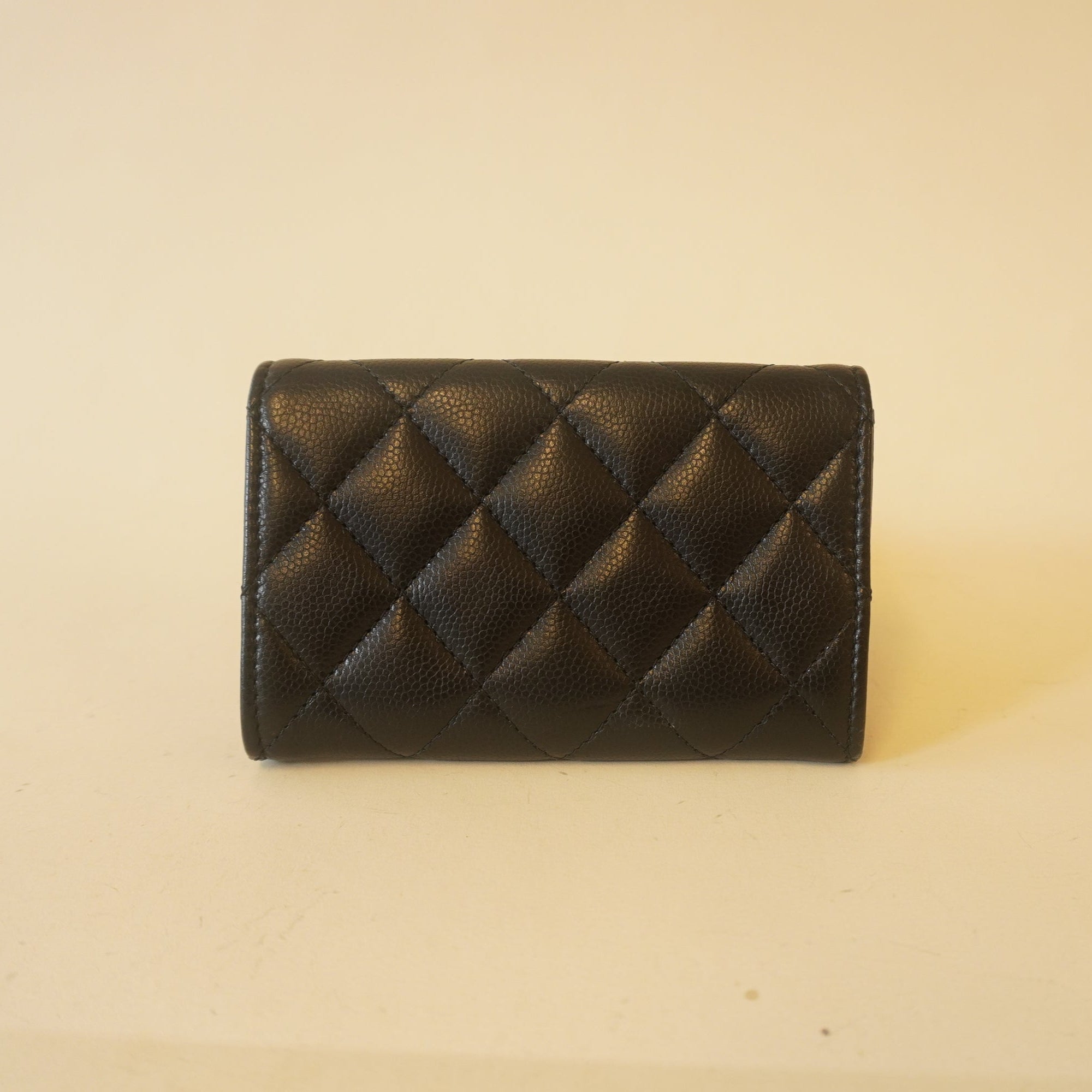 PRE-OWNED Caviar Metal Perforated Quilted CC Flap Card Holder Black