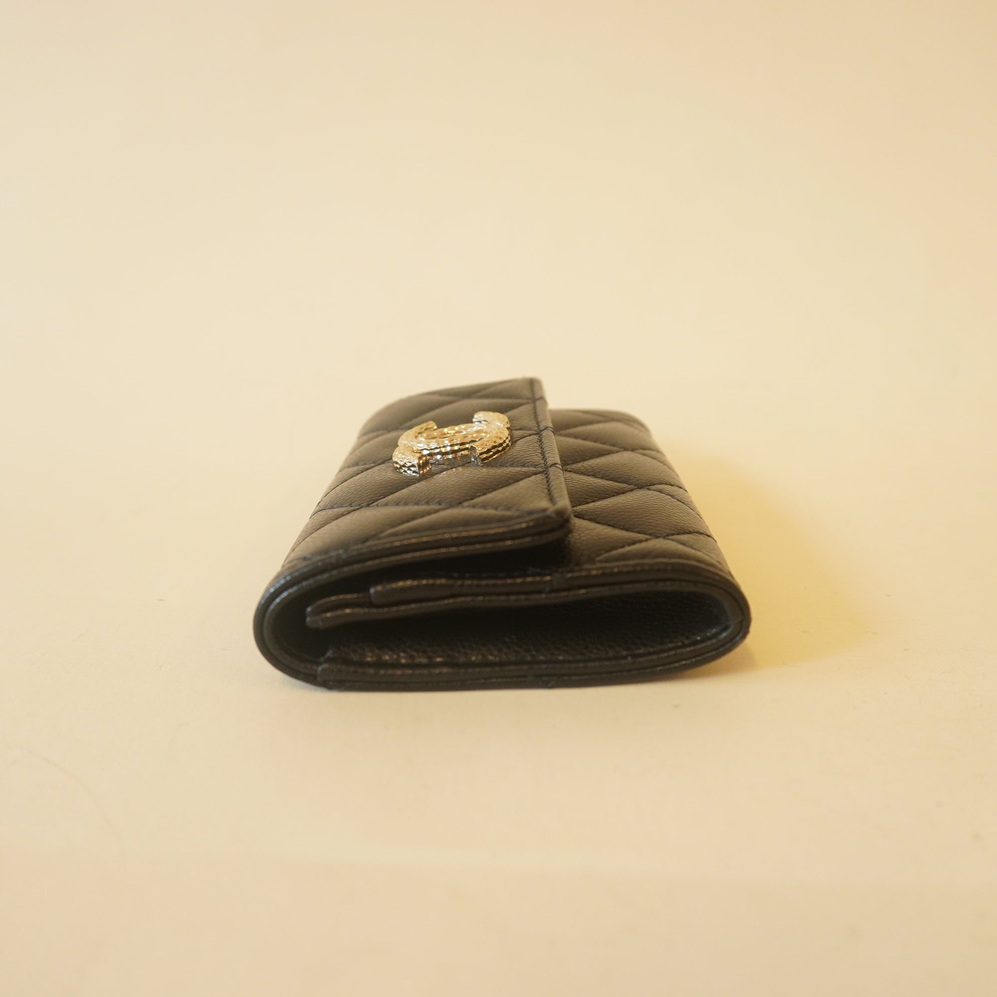 PRE-OWNED Caviar Metal Perforated Quilted CC Flap Card Holder Black