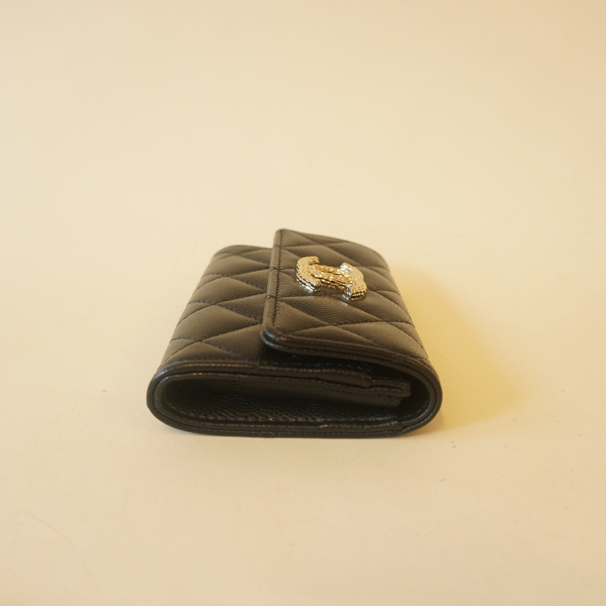 PRE-OWNED Caviar Metal Perforated Quilted CC Flap Card Holder Black