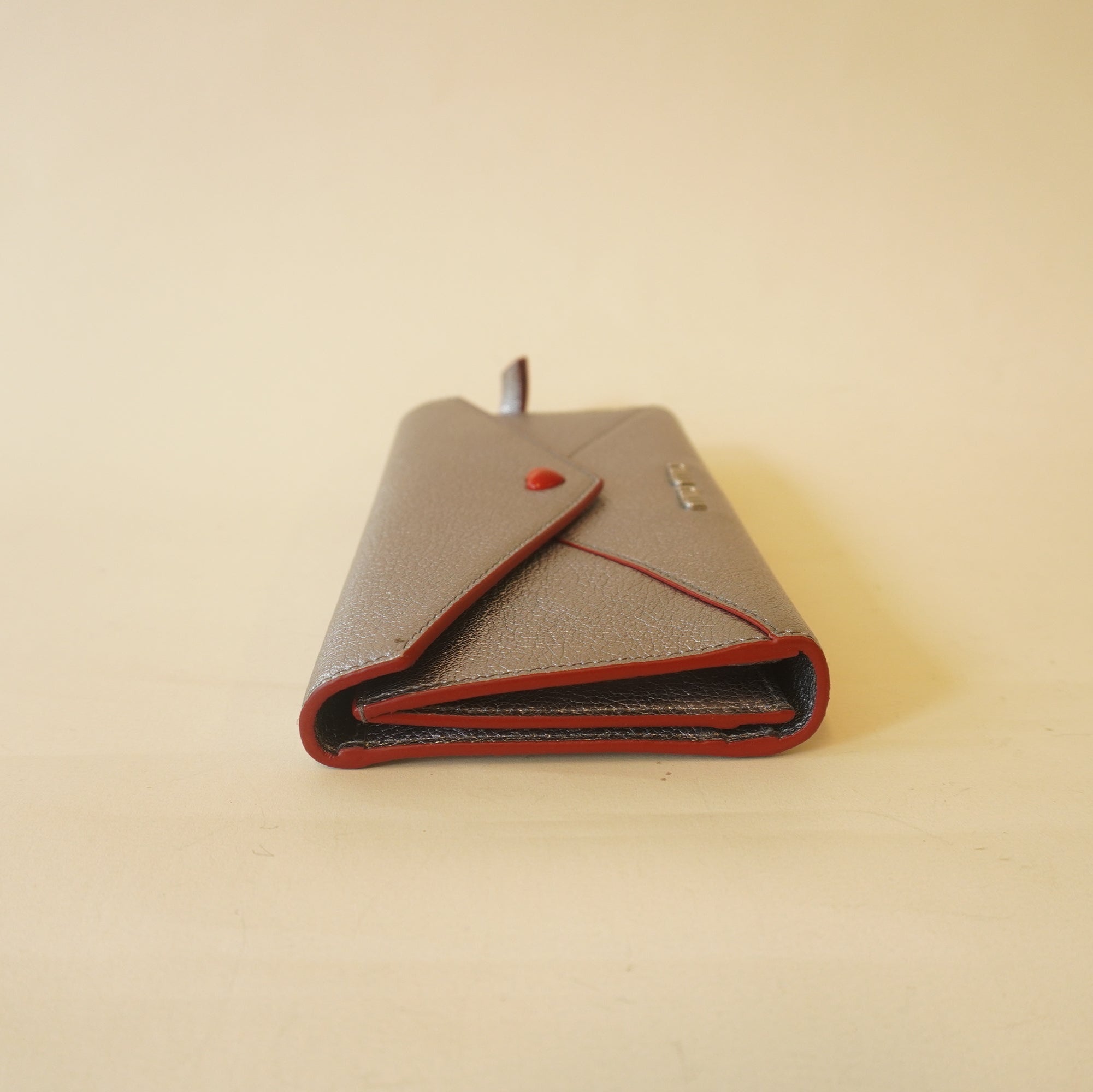 PRE-OWNED Silver Goatskin Madras Love Envelope Wallet Cromo