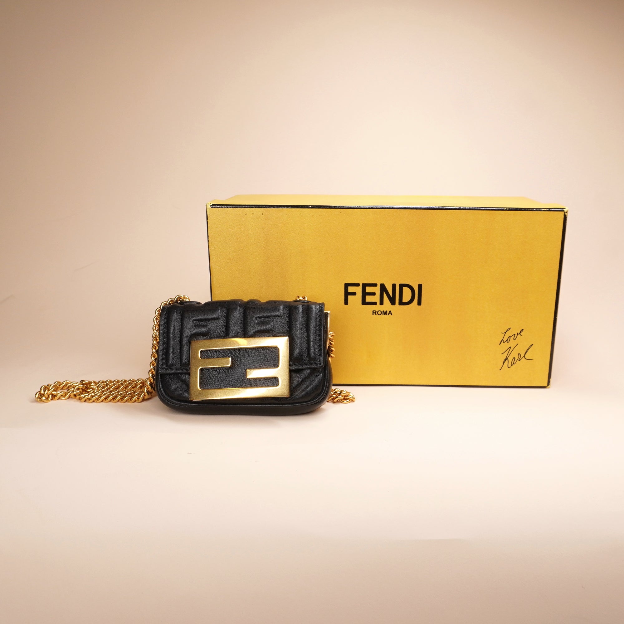 PRE-OWNED Black Embossed Leather Nano Baguette Crossbody Bag