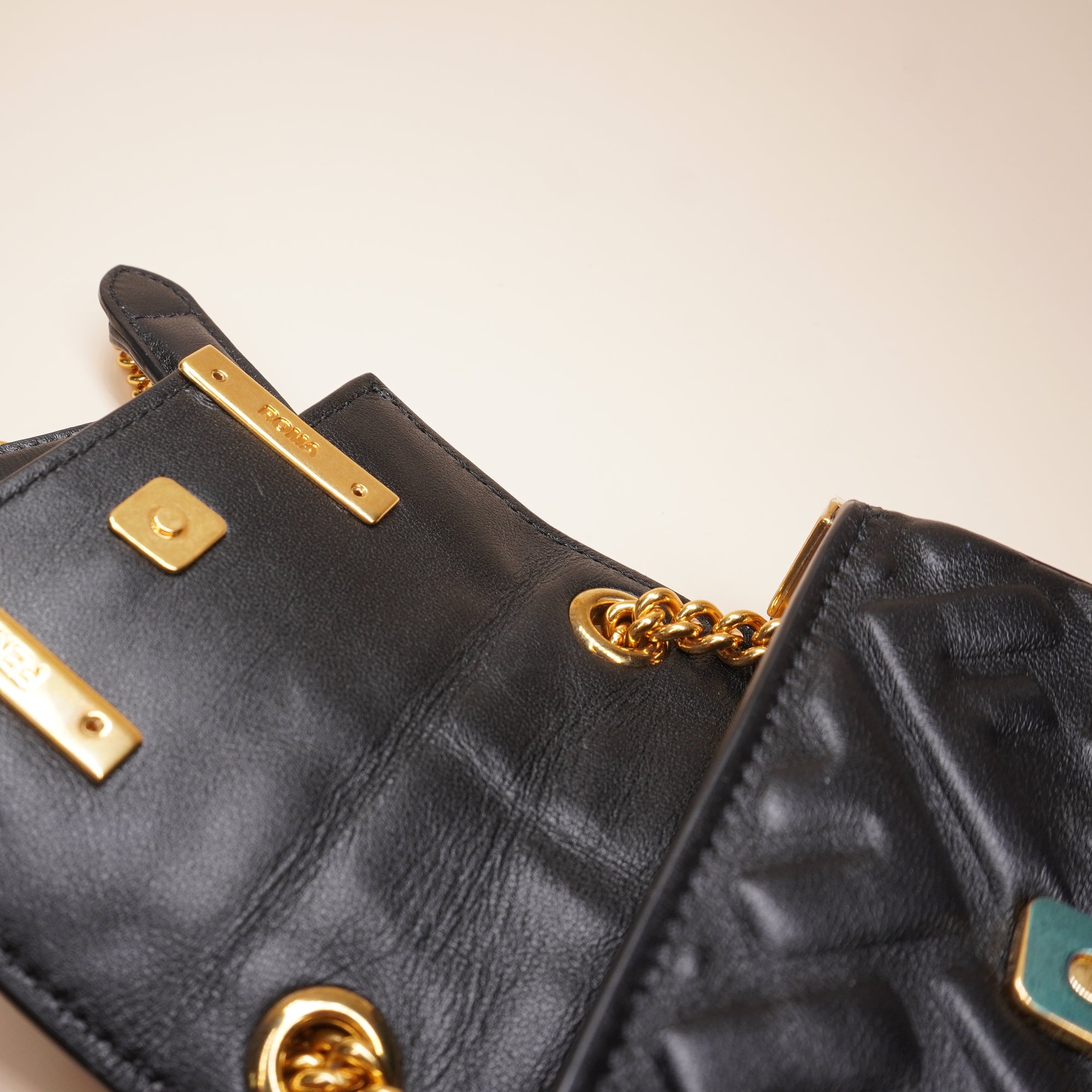 PRE-OWNED Black Embossed Leather Nano Baguette Crossbody Bag