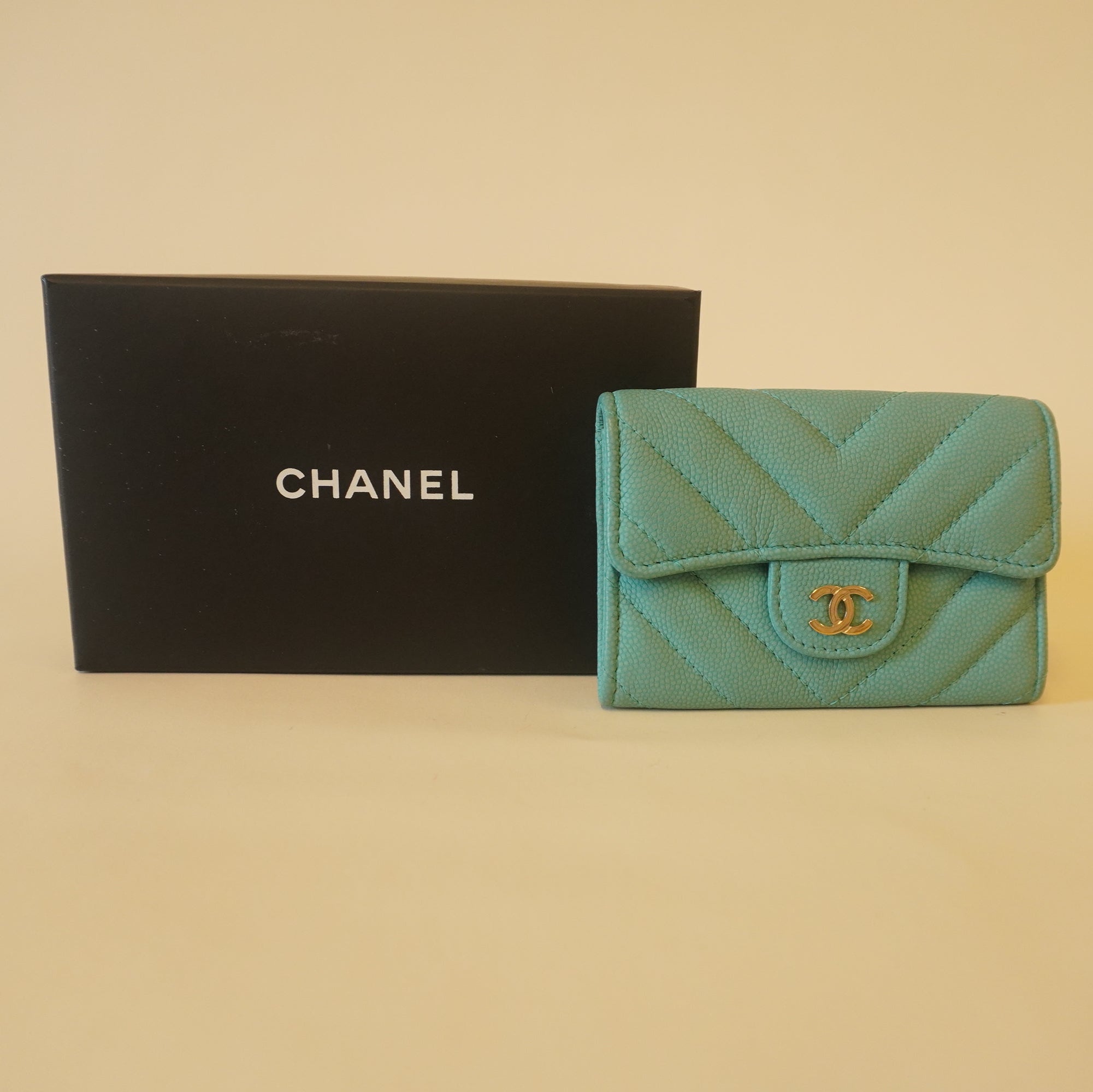 PRE-OWNED CC Acqua Caviar Chevron Quilted Card Holder Wallet