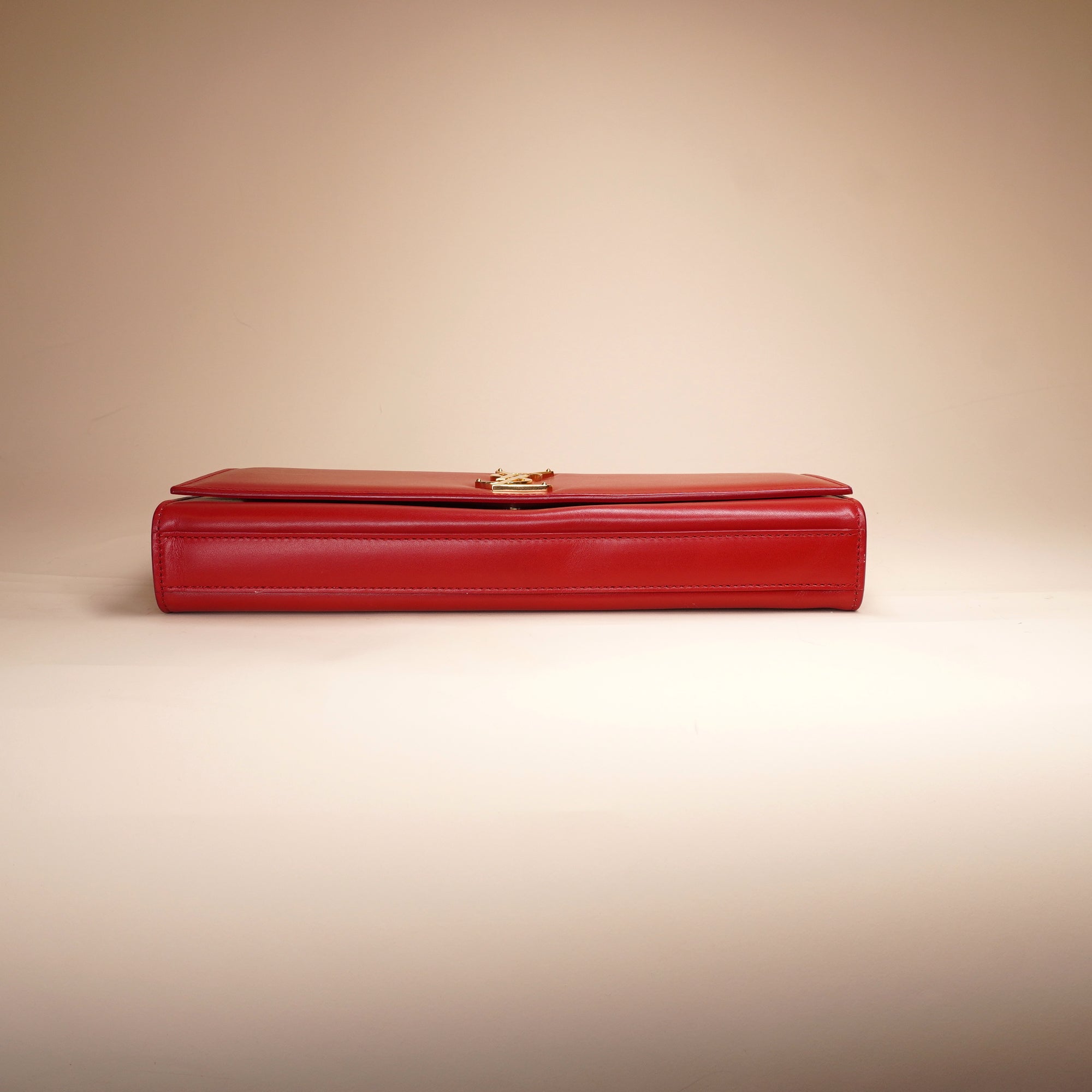 PRE-OWNED Red Leather Cassandre Clutch
