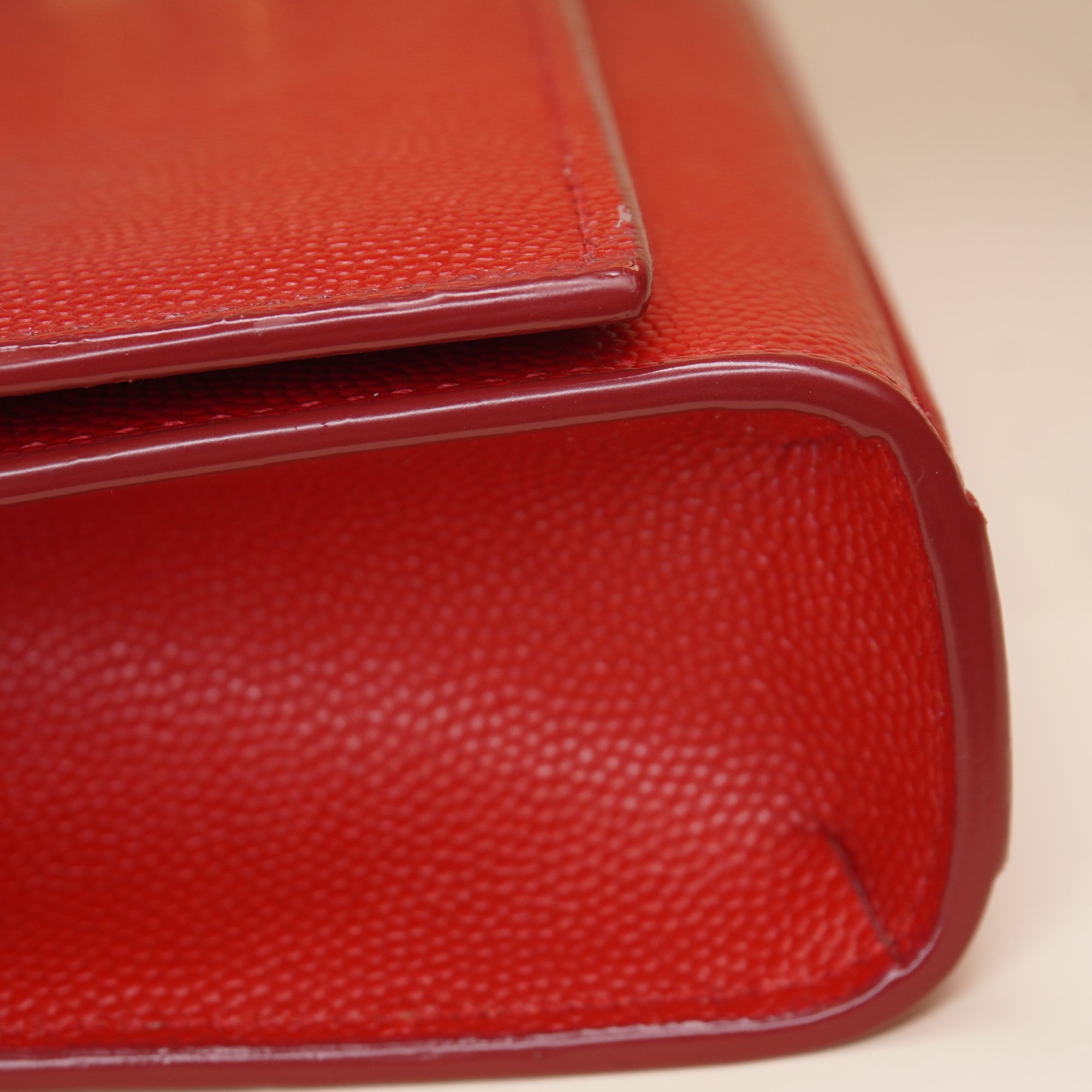 PRE-OWNED Grain De Poudre Classic Monogram Red Cassandre Clutch