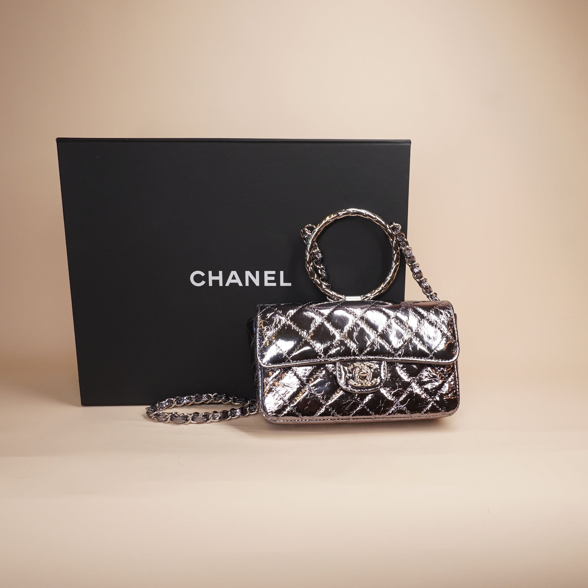 PRE-OWNED CC Quilted Metallic Calfskin Mini Top Handle Flap Bag