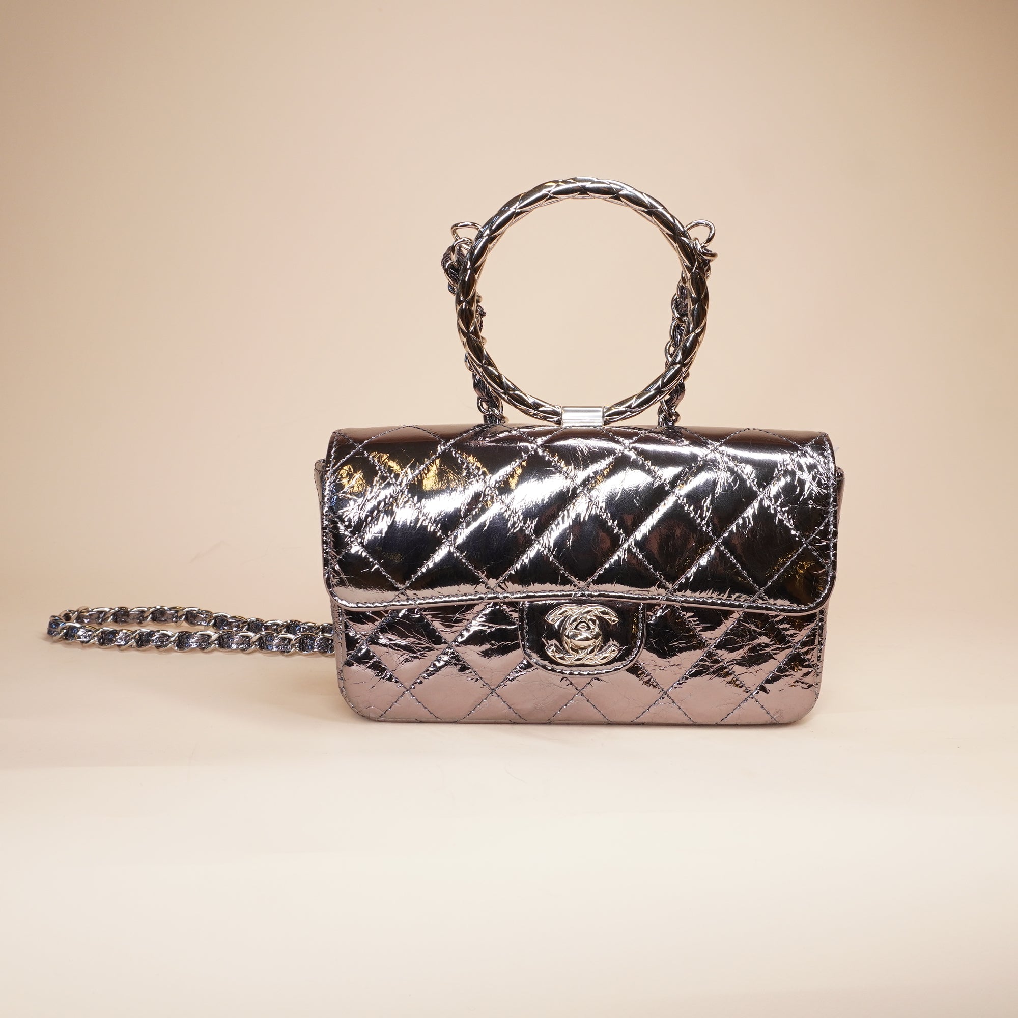 PRE-OWNED CC Quilted Metallic Calfskin Mini Top Handle Flap Bag