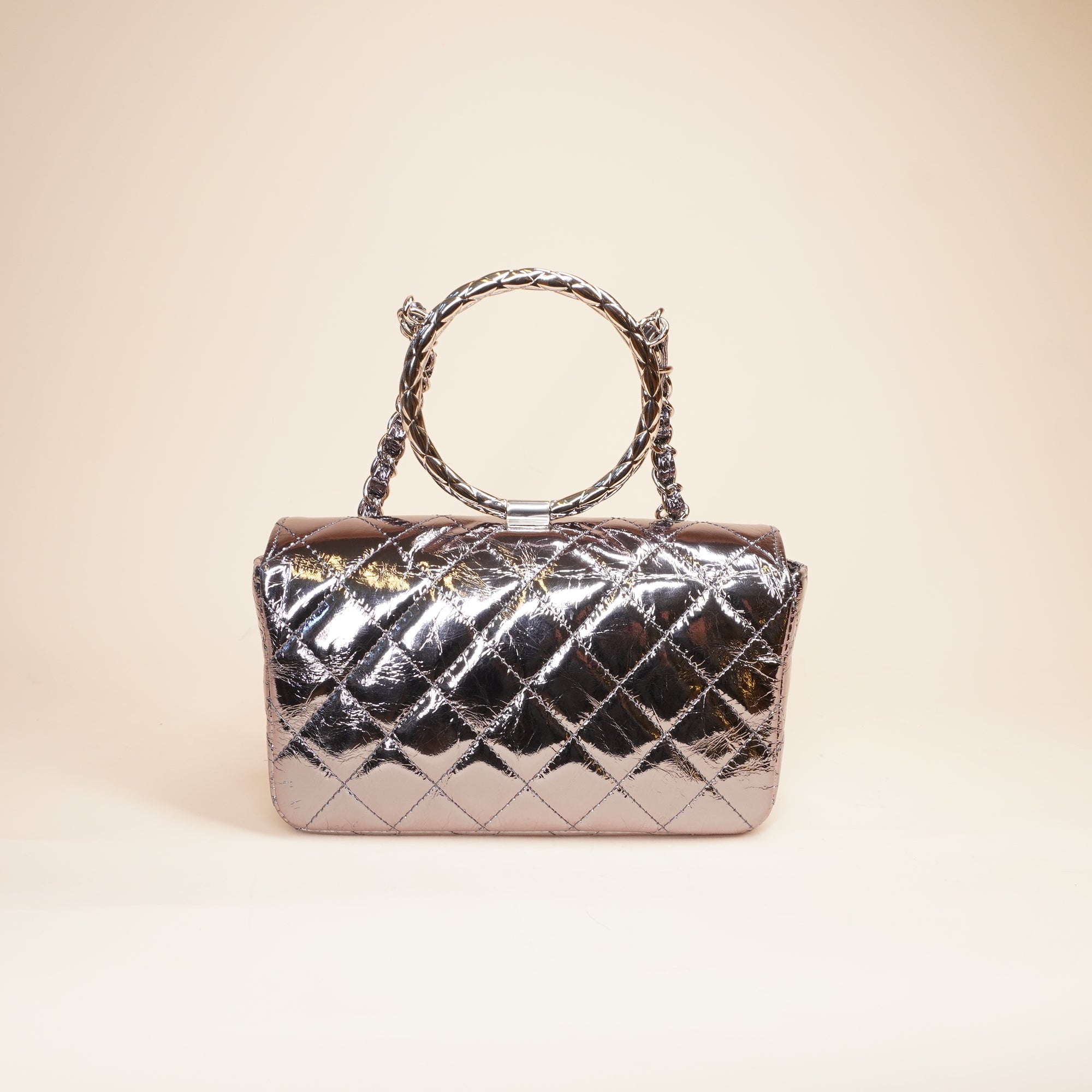 PRE-OWNED CC Quilted Metallic Calfskin Mini Top Handle Flap Bag