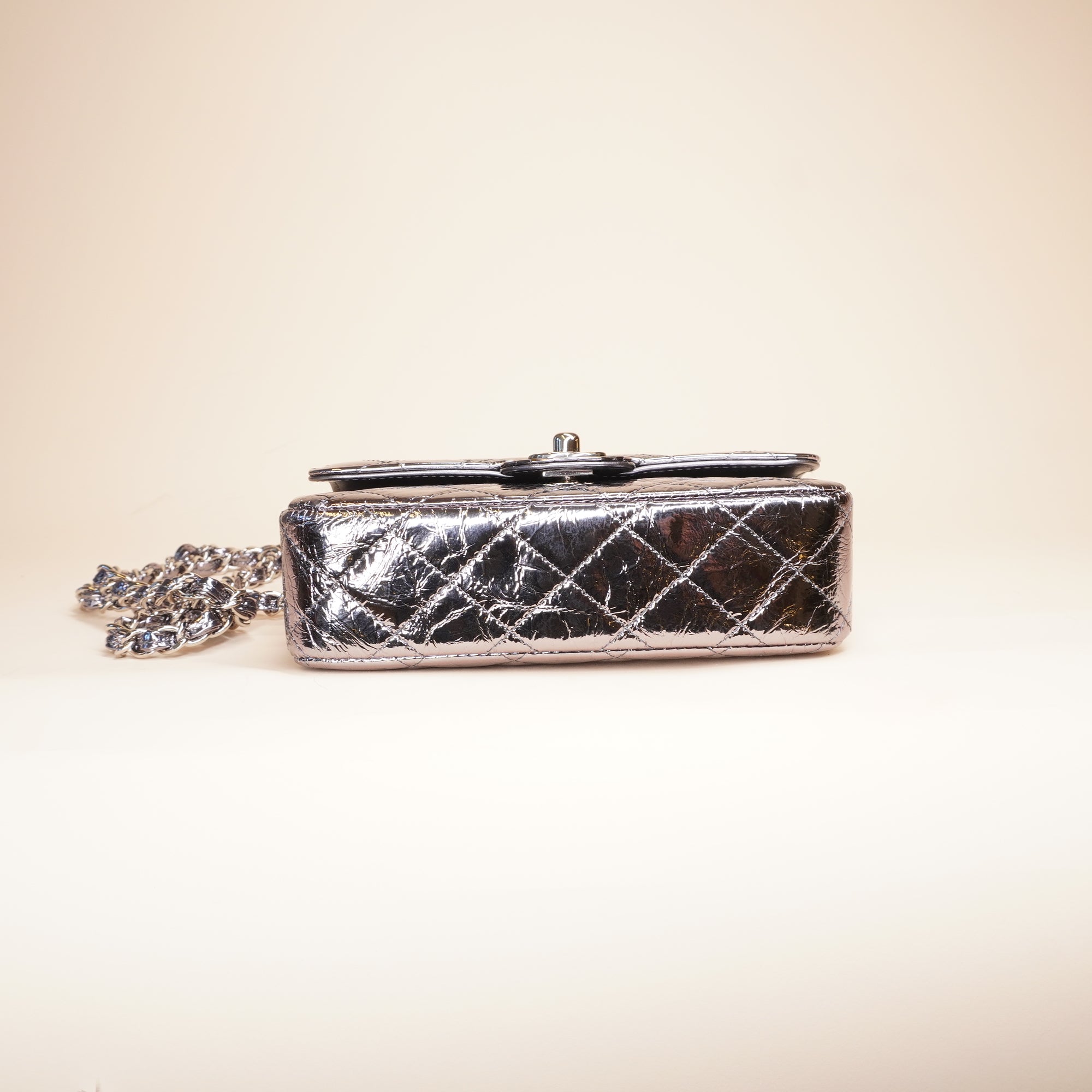 PRE-OWNED CC Quilted Metallic Calfskin Mini Top Handle Flap Bag
