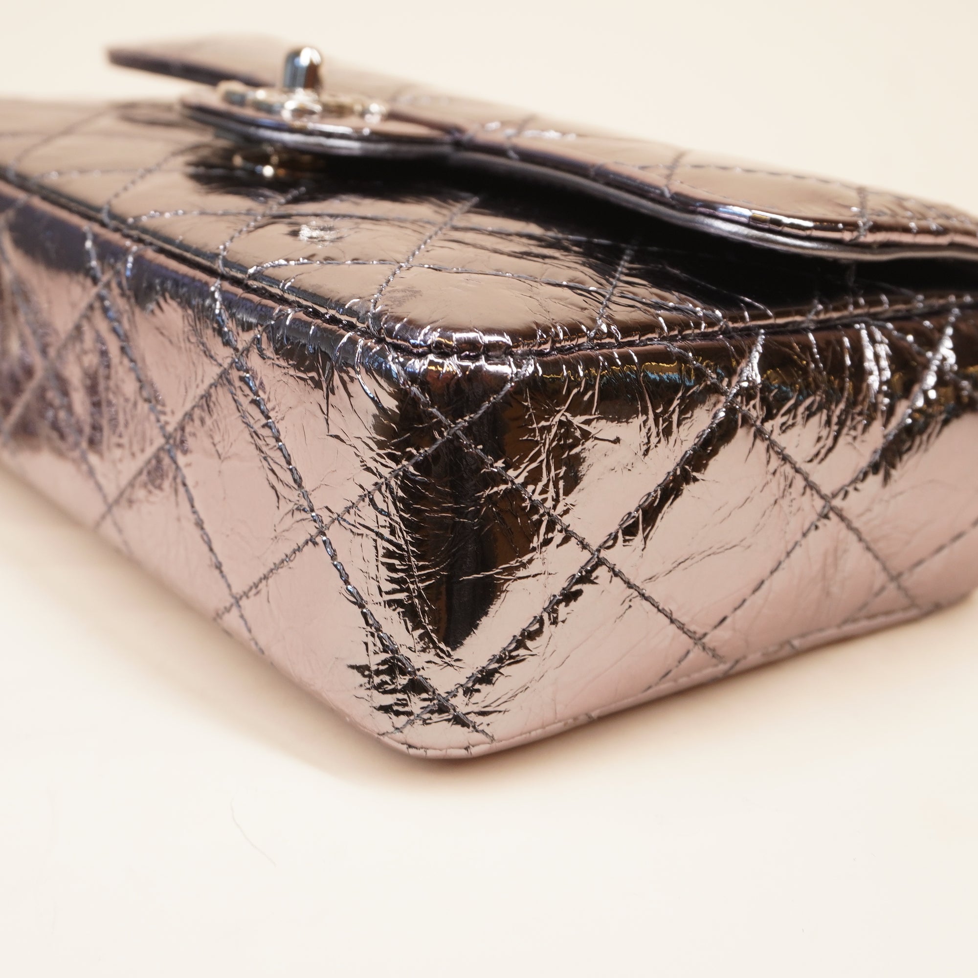 PRE-OWNED CC Quilted Metallic Calfskin Mini Top Handle Flap Bag
