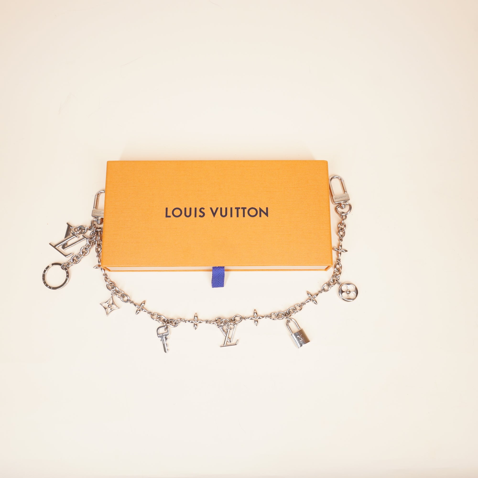 PRE-OWNED LV Iconic Silver Bag Charm