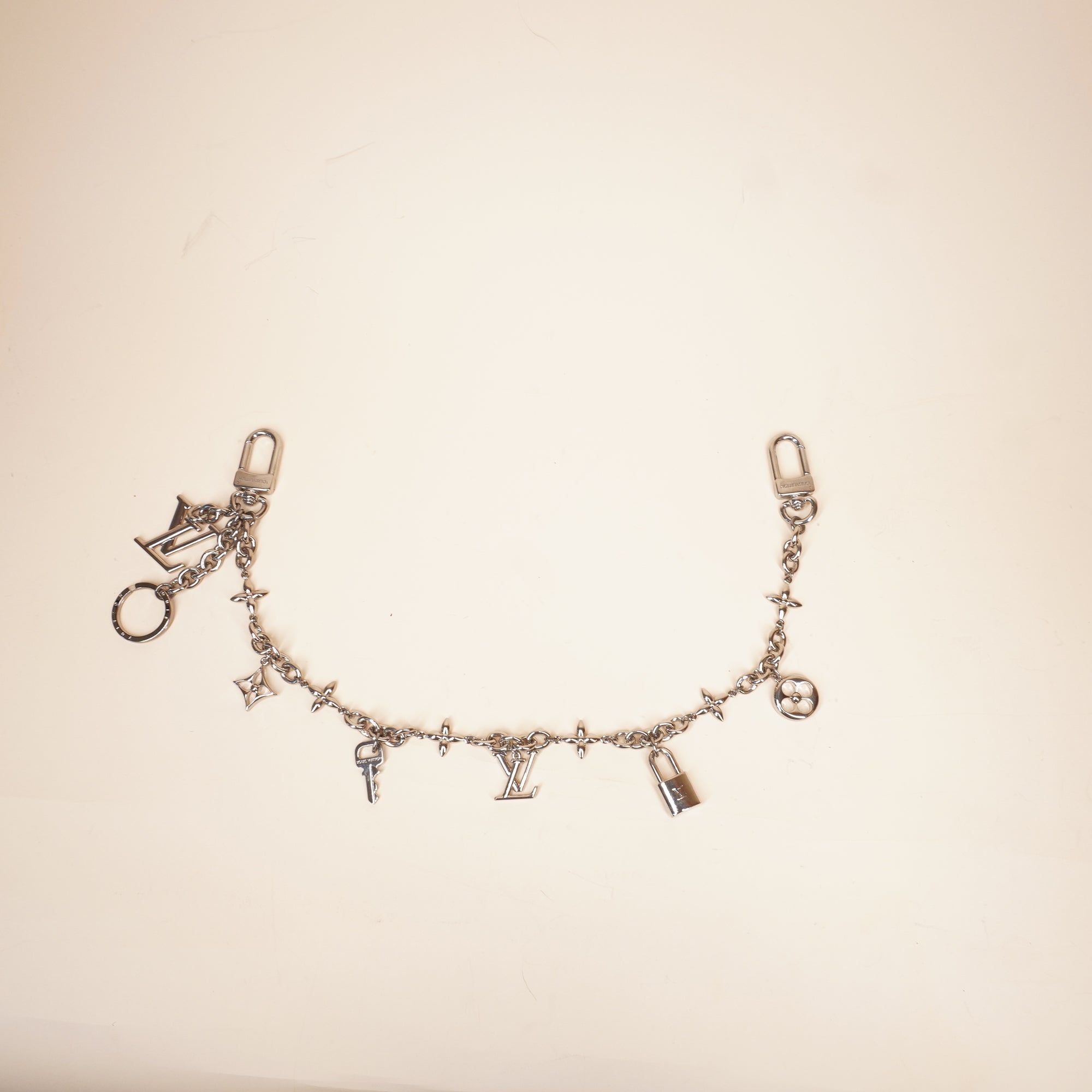 PRE-OWNED LV Iconic Silver Bag Charm