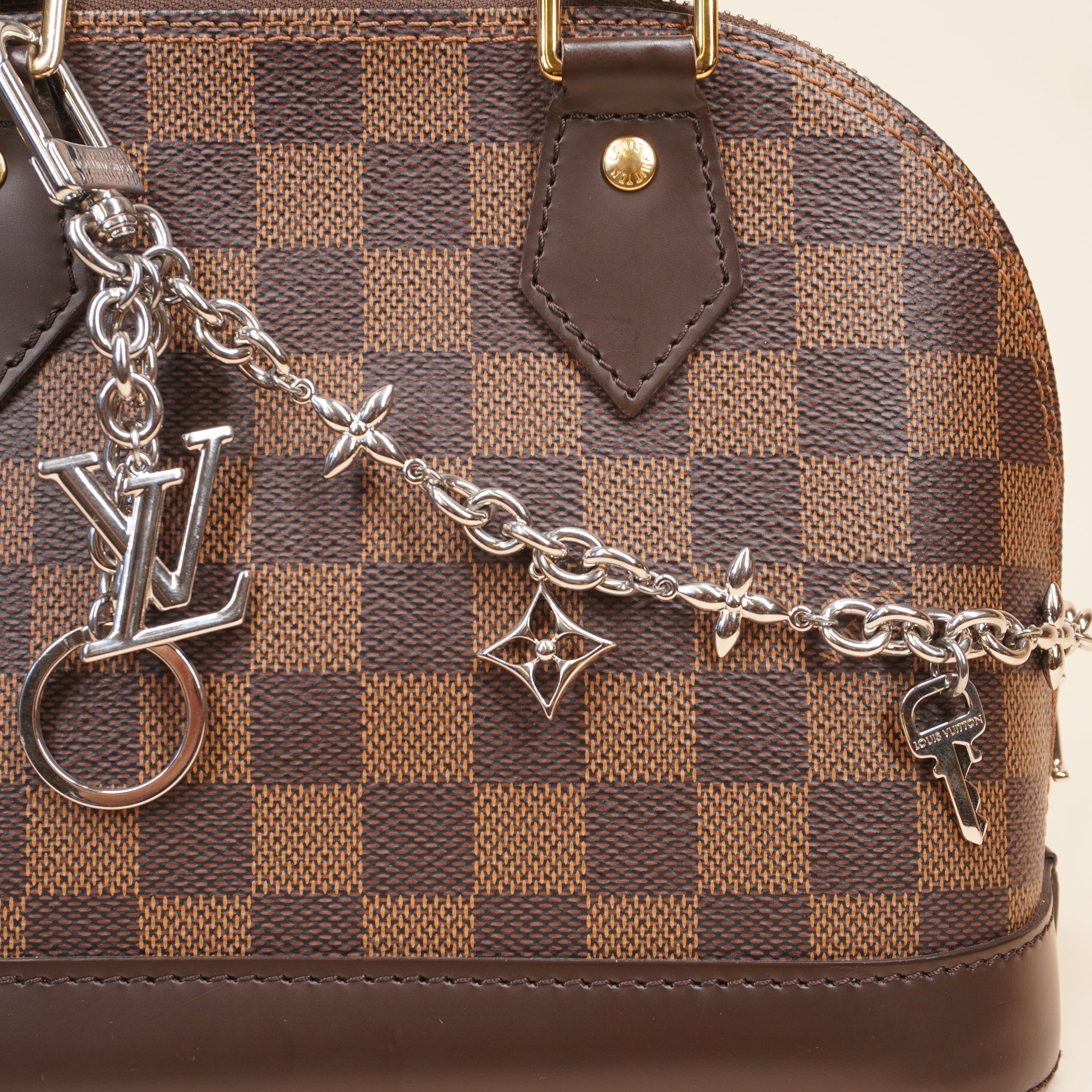 PRE-OWNED LV Iconic Silver Bag Charm