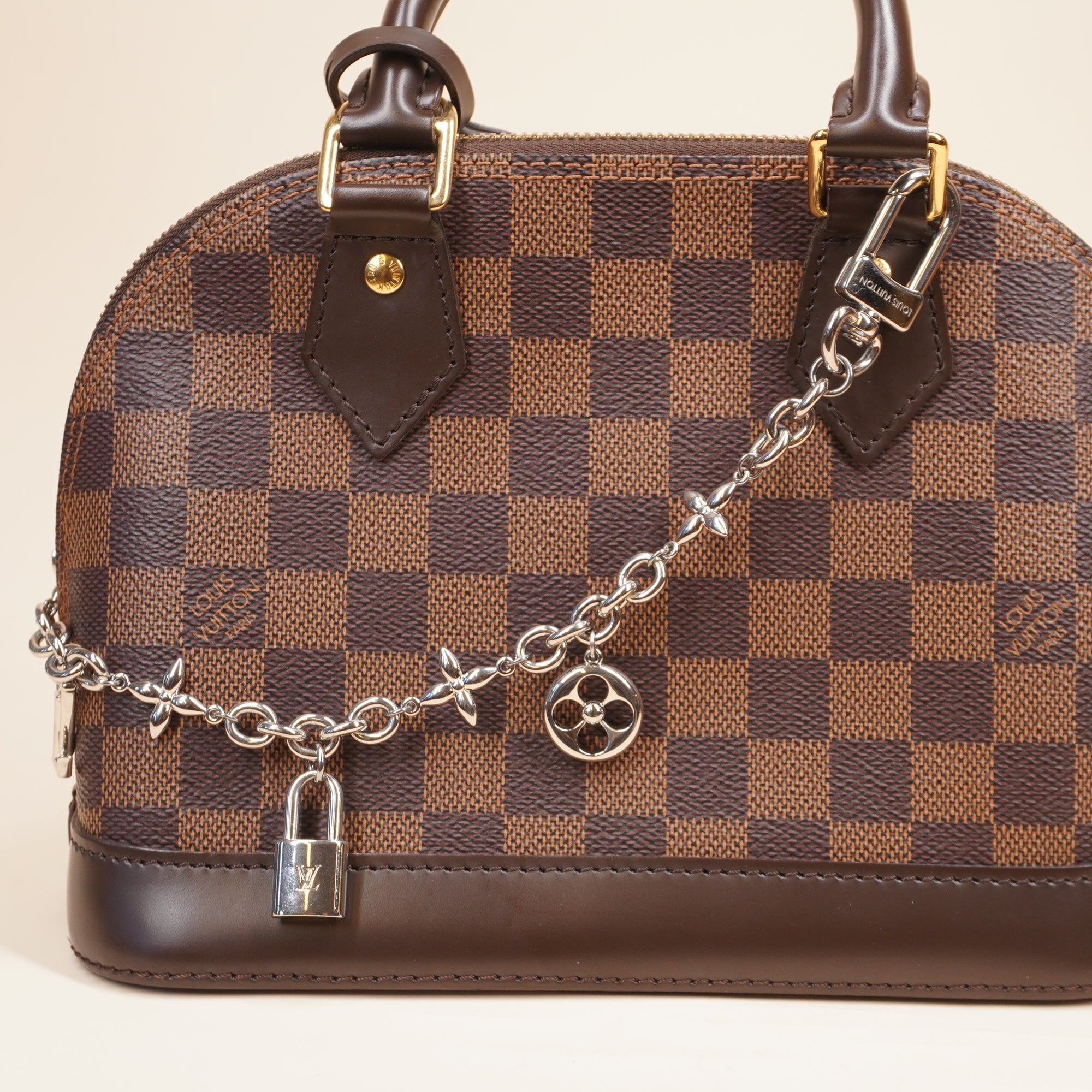 PRE-OWNED LV Iconic Silver Bag Charm