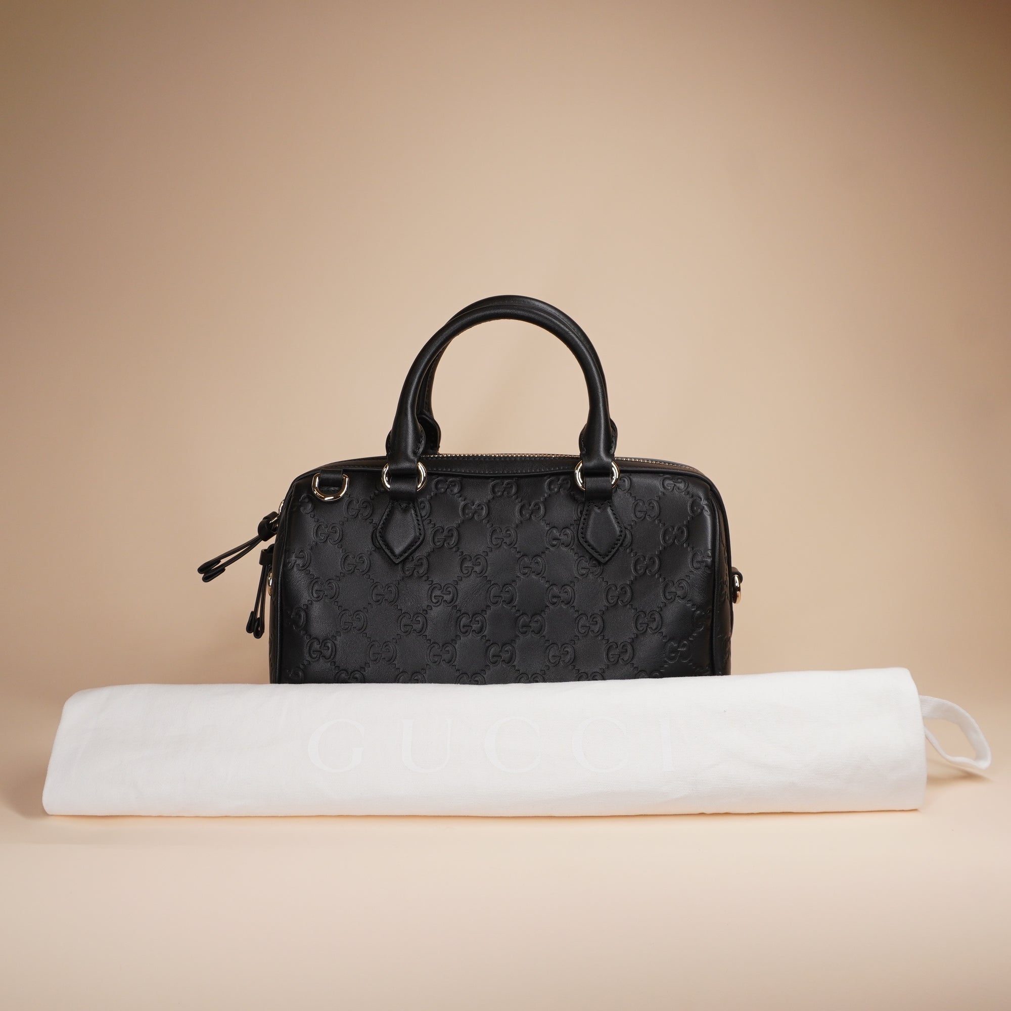 PRE-OWNED GG Grainy Calfskin Emblem Small Boston Bag Black