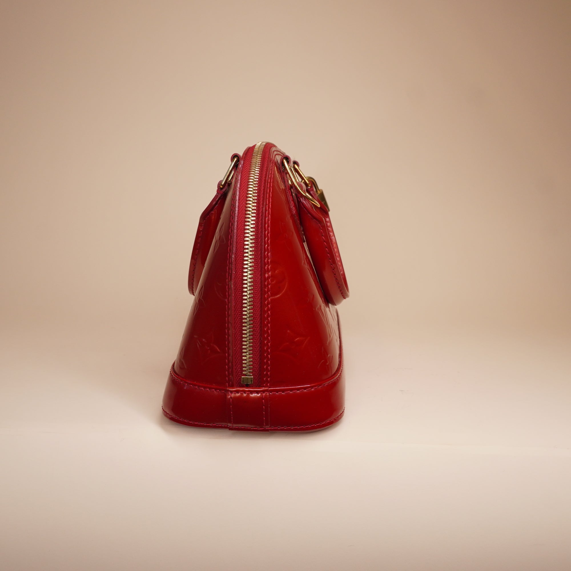 PRE-OWNED LV Red Monogram Vernis Alma BB Satchel