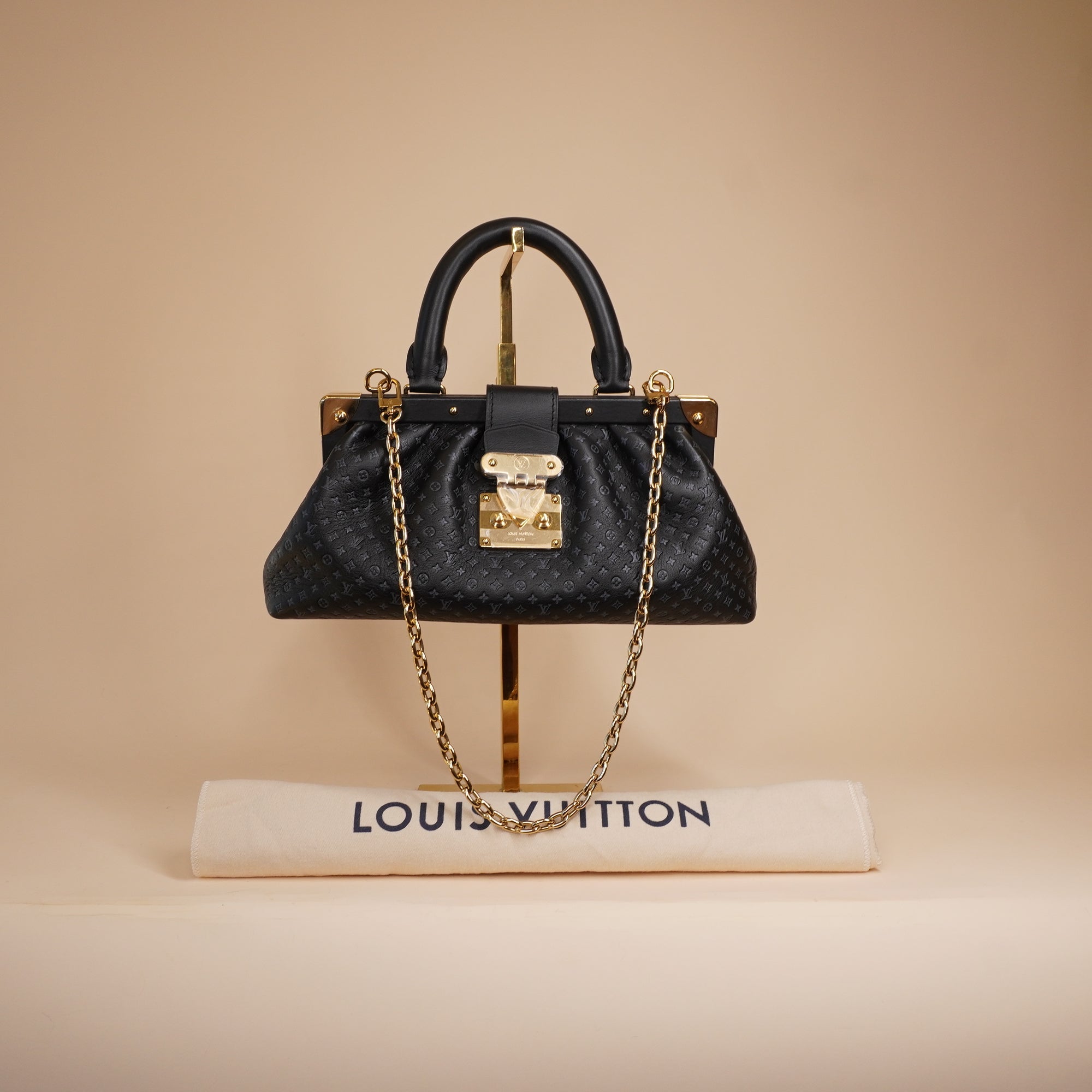 PRE-OWNED LV Calfskin Nanogram Embossed Black Clutch Bag