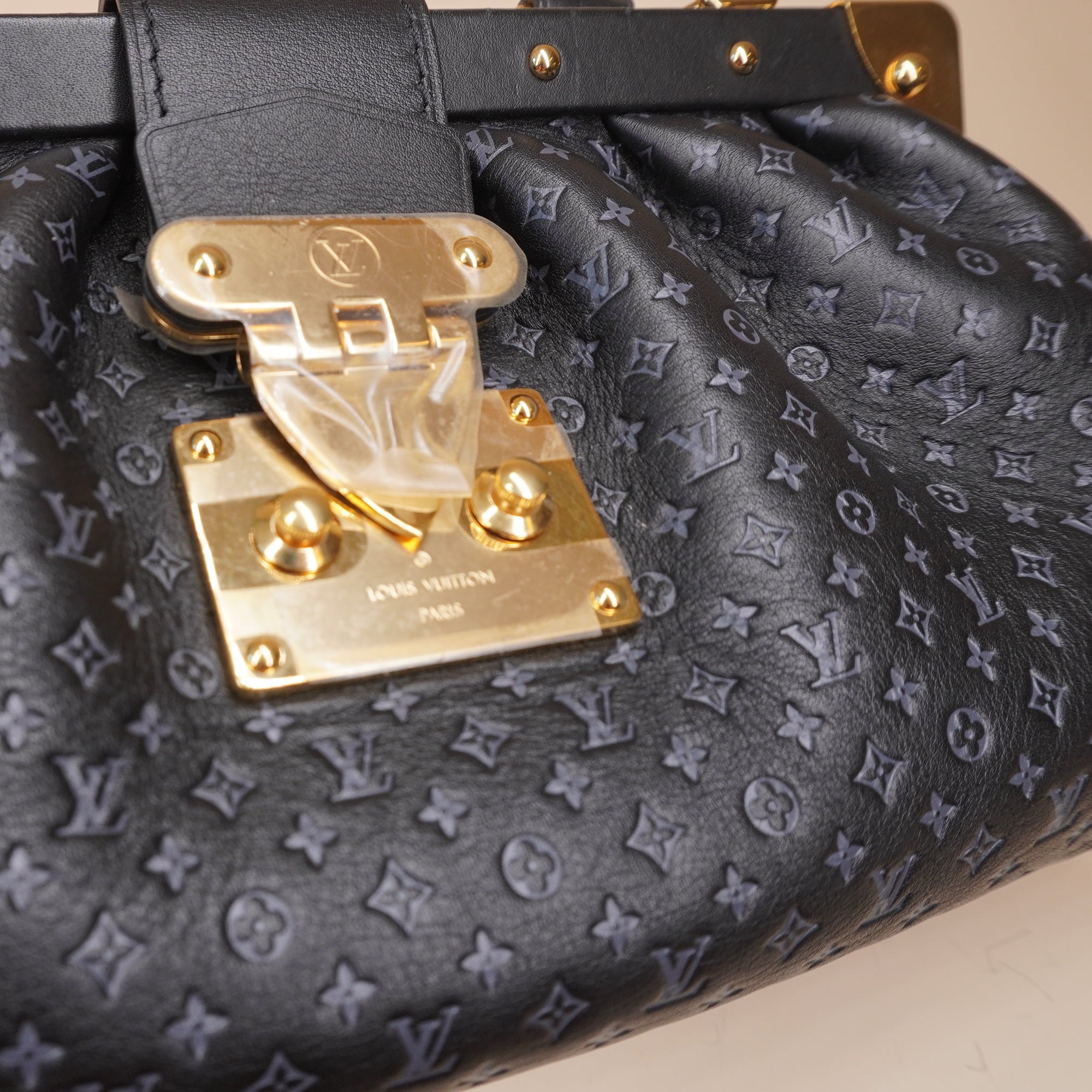 PRE-OWNED LV Calfskin Nanogram Embossed Black Clutch Bag