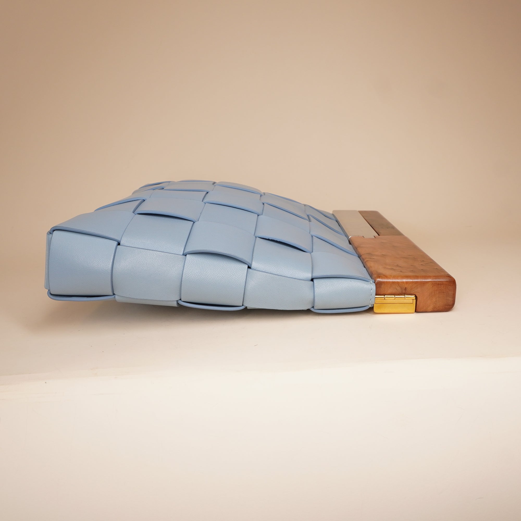 PRE-OWNED Light Blue Intrecciato Leather and Wood The Snap Clutch