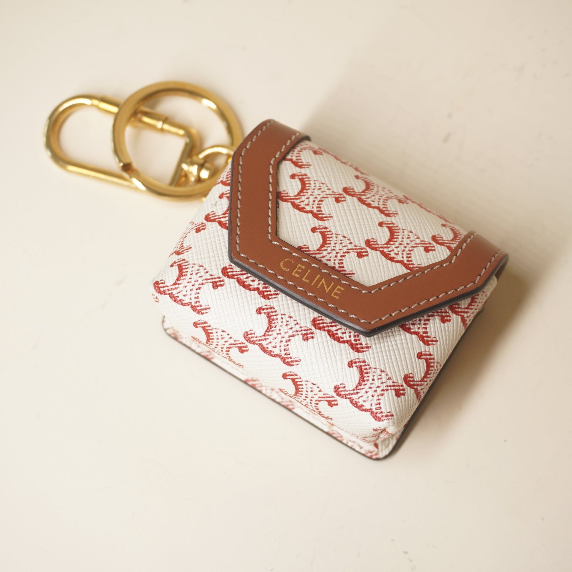 PRE-OWNED Triomphe Canvas Calfskin Airpods Case Charm