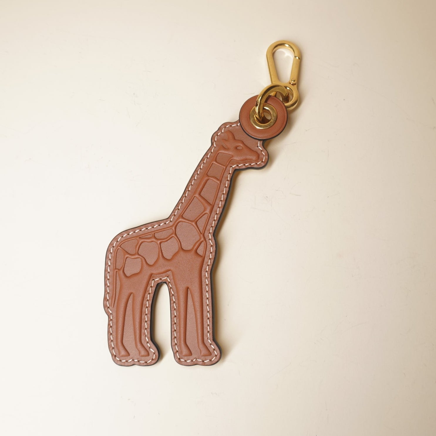 PRE-OWNED Giraffe leather brown bag charm