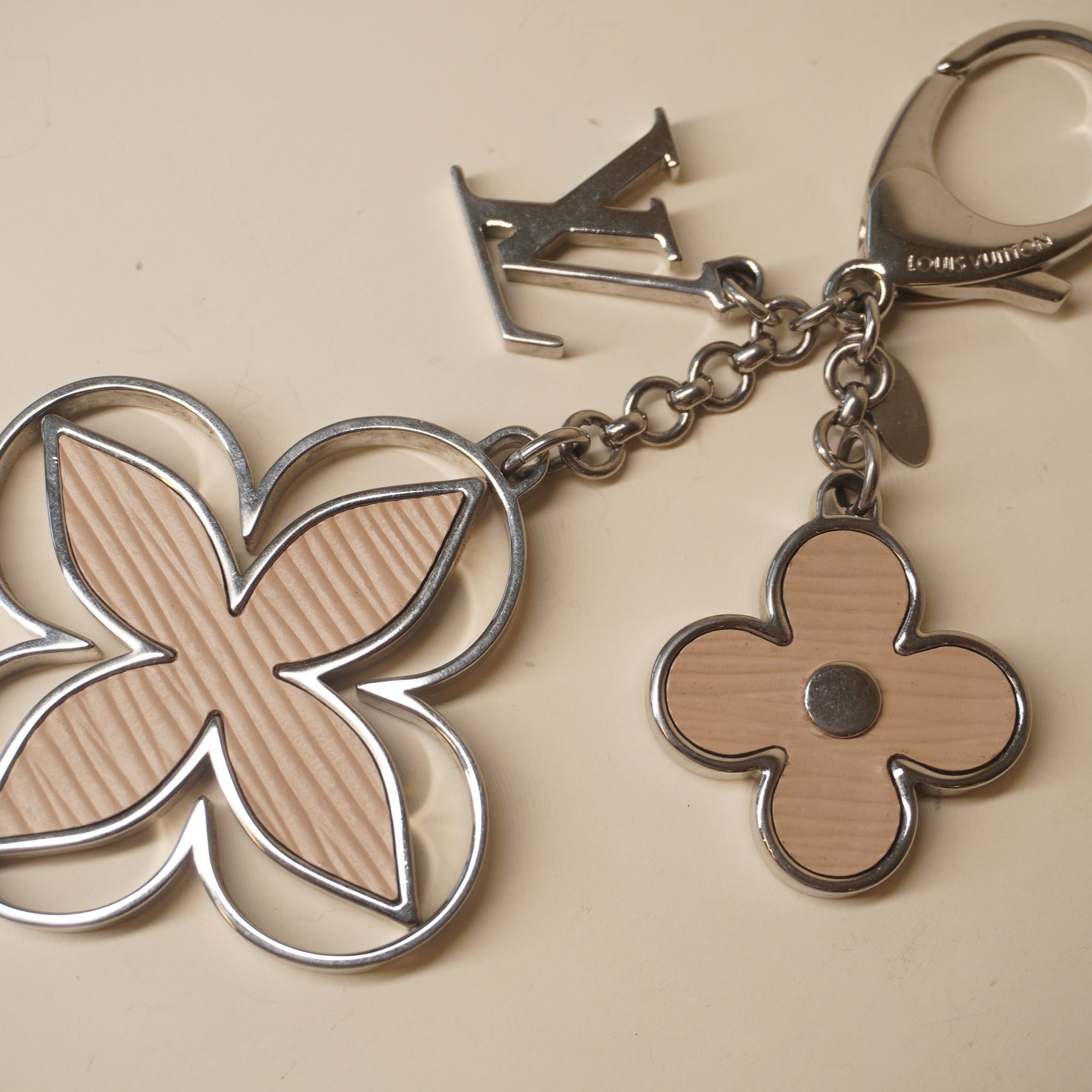 PRE-OWNED Epi Rimy Beige Bag Charm 