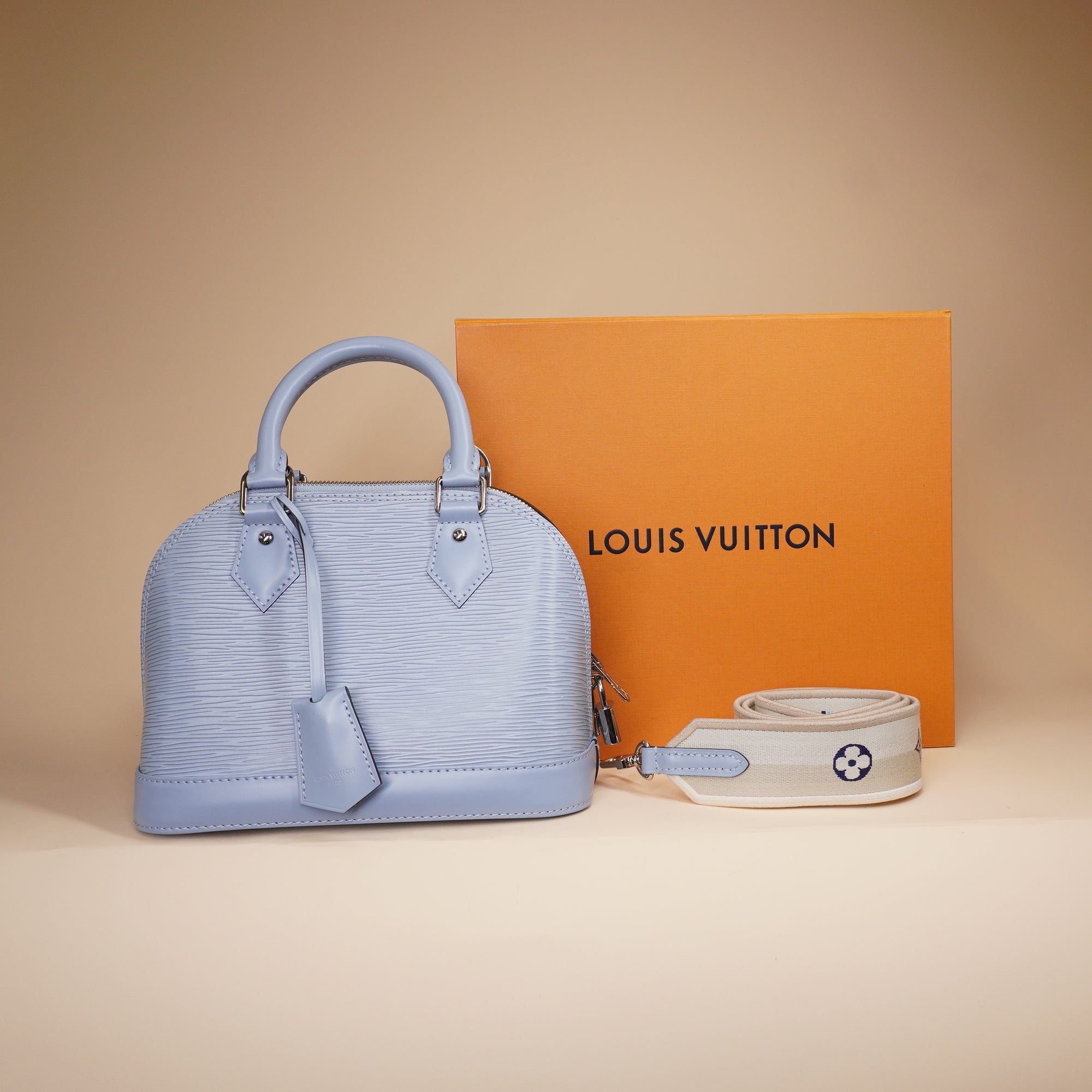 PRE-OWNED LV Bleu Nuage Epi Leather Alma BB Bag with Jacquard Strap
