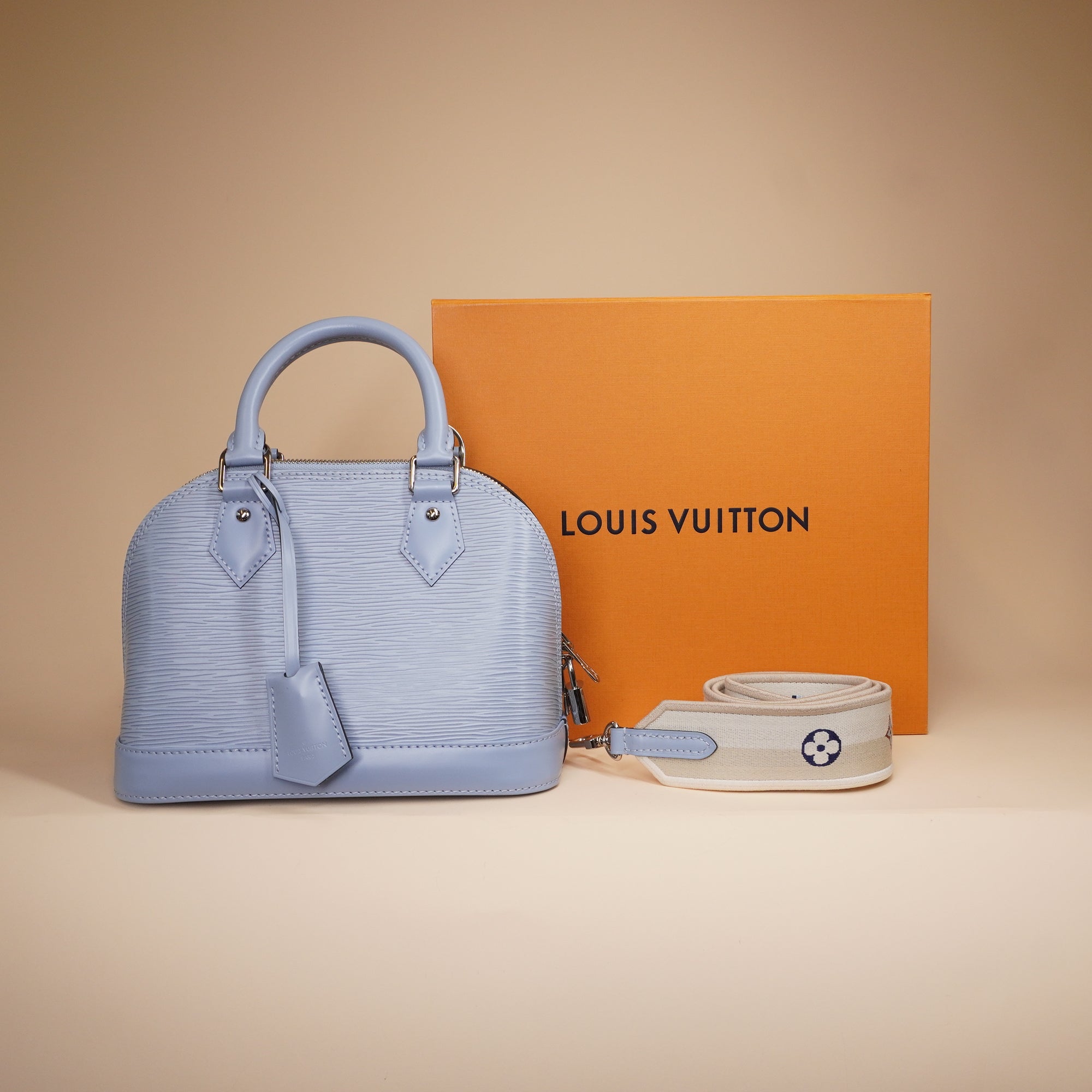 PRE-OWNED LV Bleu Nuage Epi Leather Alma BB Bag with Jacquard Strap
