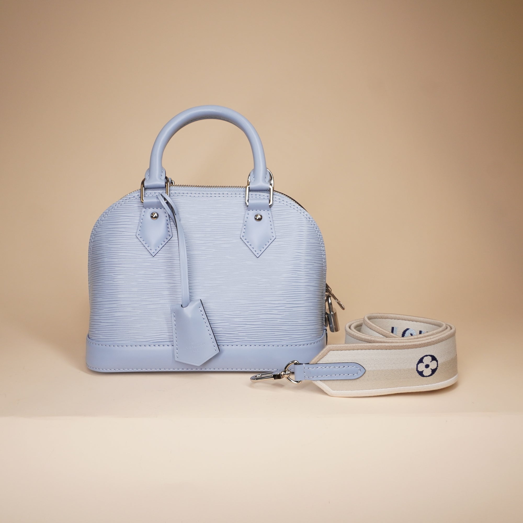 PRE-OWNED LV Bleu Nuage Epi Leather Alma BB Bag with Jacquard Strap
