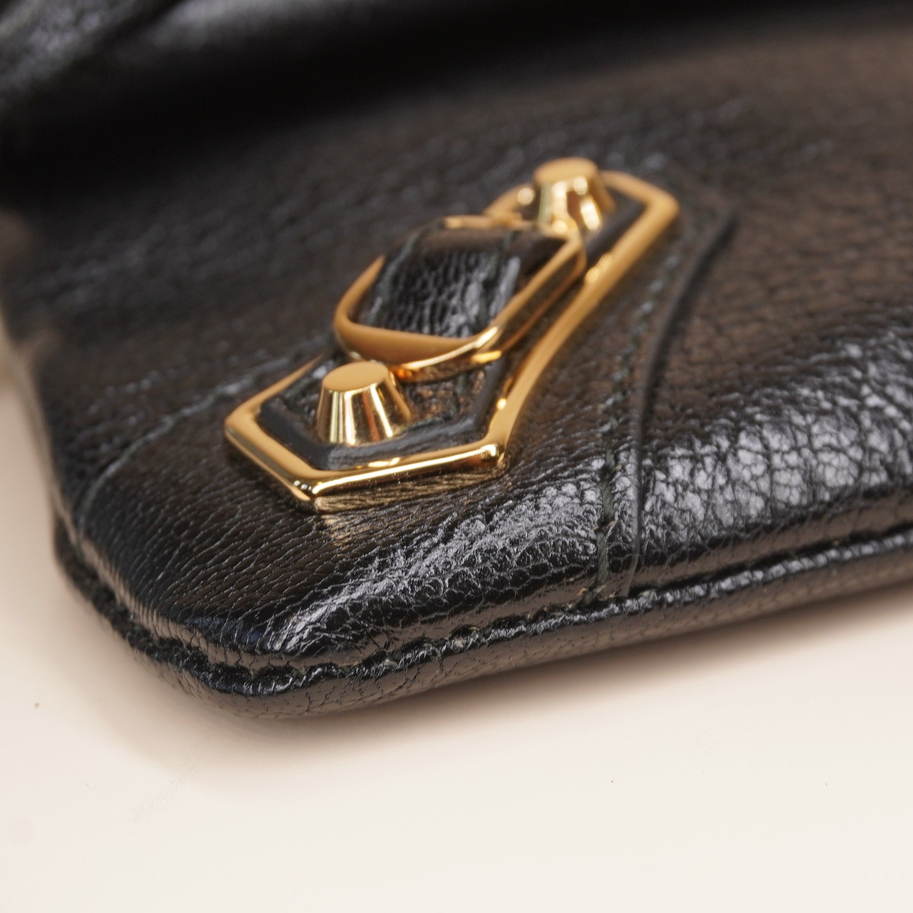 PRE-OWNED Chevre Gold Metallic Edge Hardware Envelope Clutch Black