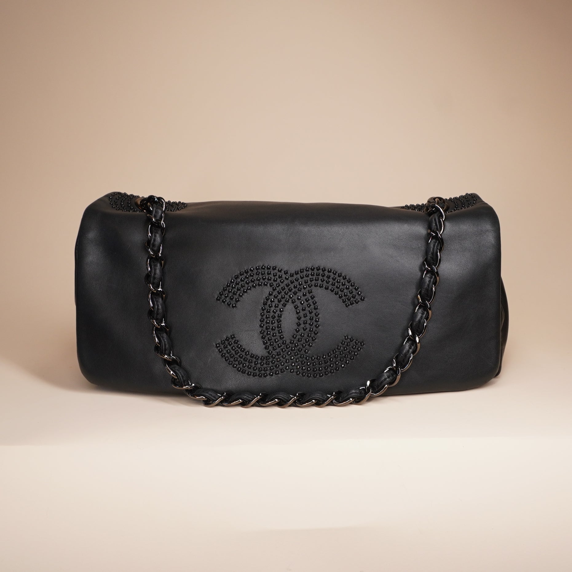 PRE-OWNED Lambskin Studded East West Flap Black